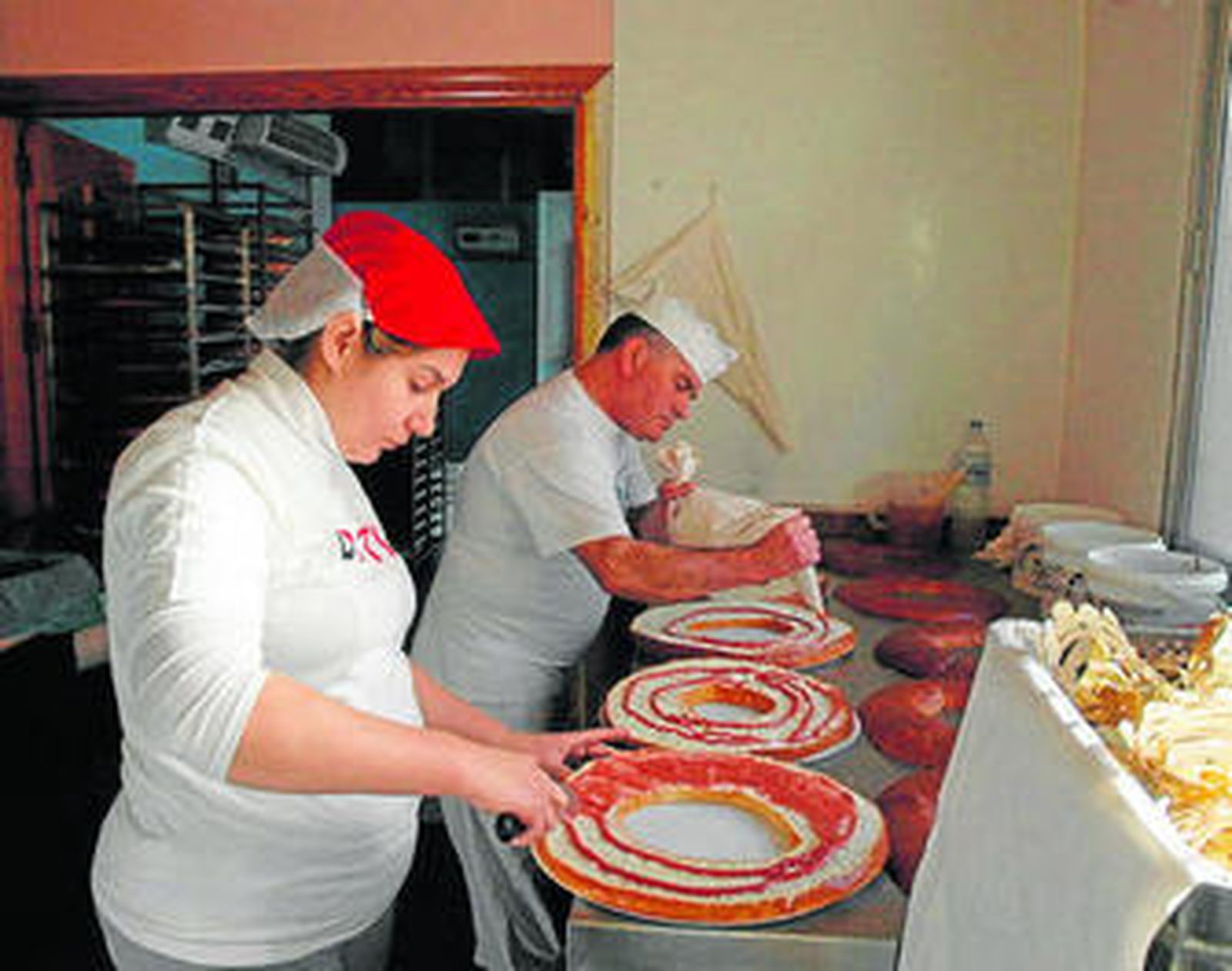 Trabajadores de la pastelería Ortiz.