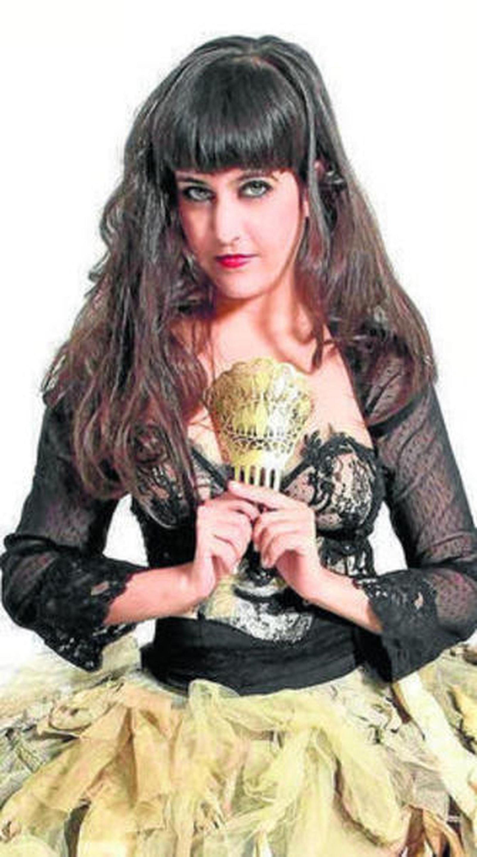 Maui, con su peineta.