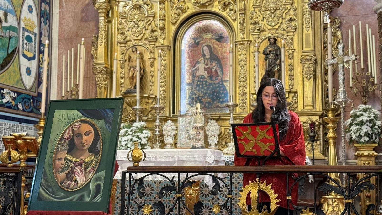 Malugalo en la presentación del cartel en el altar de la Virgen de la Cinta.
