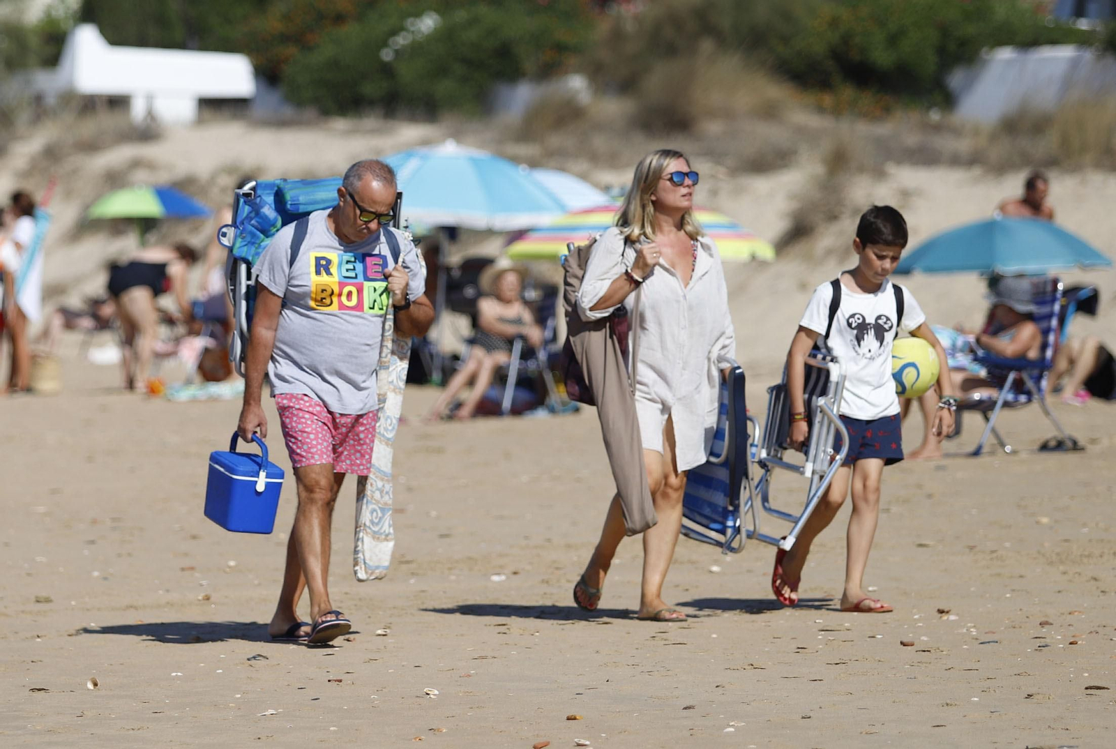 Imágenes del último sábado de agosto en el litoral onubense