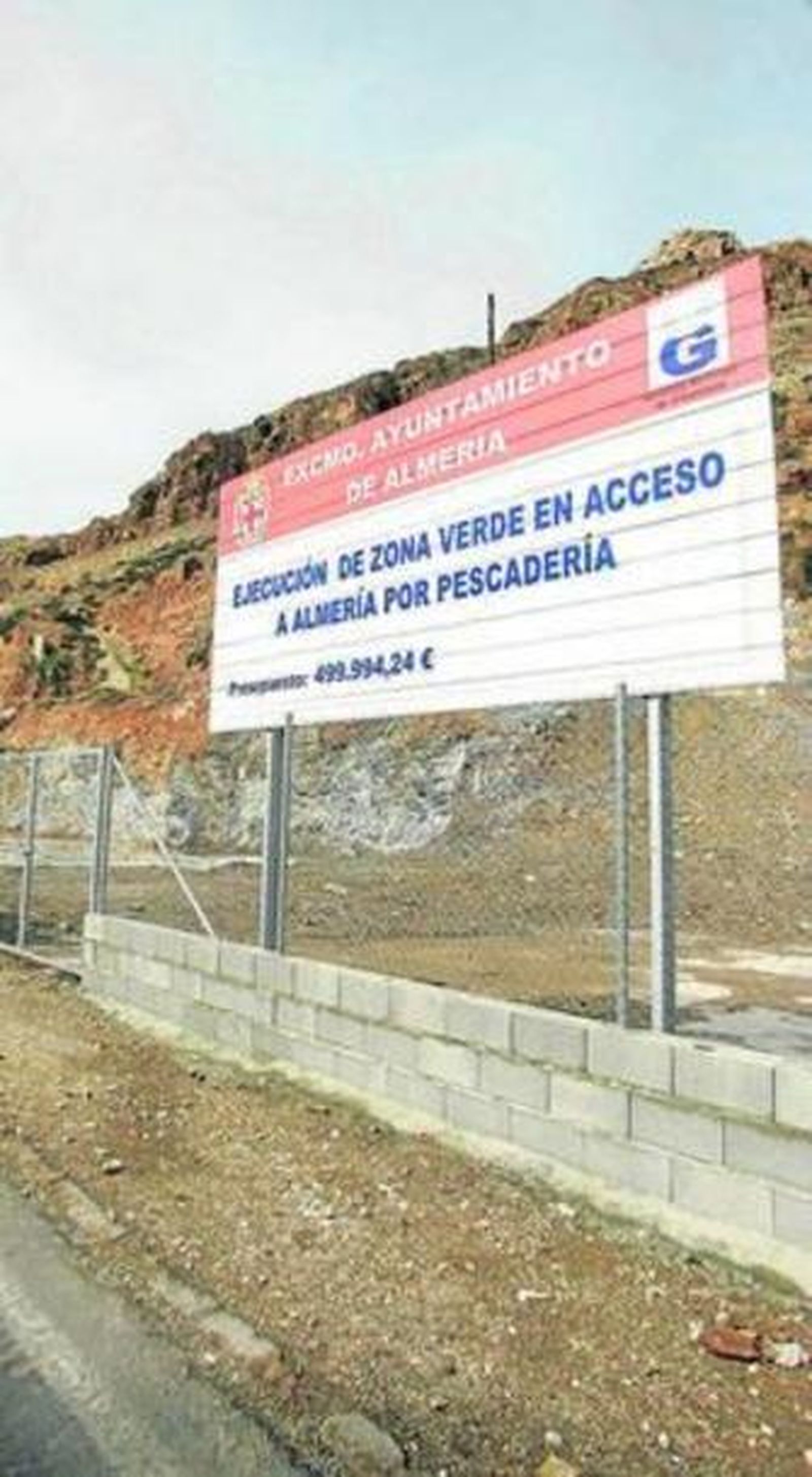 El cartel de obras.