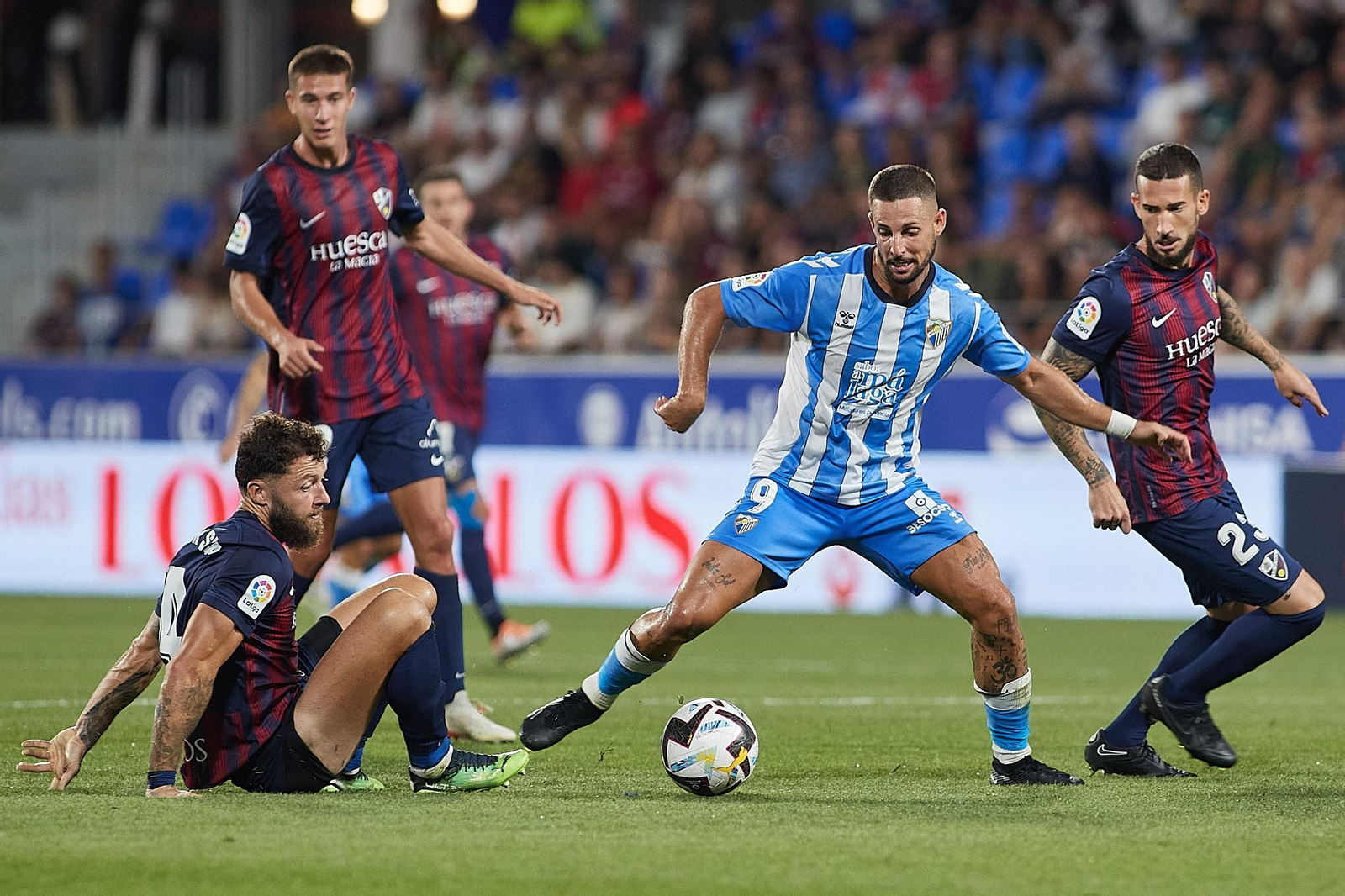 Imágenes de la derrota del Málaga CF ante el SD Huesca en El Alcoraz