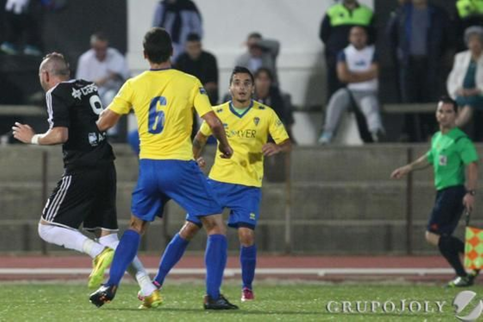 Copi, entre Garrido y Tomás. 

Foto: Paco Guerrero