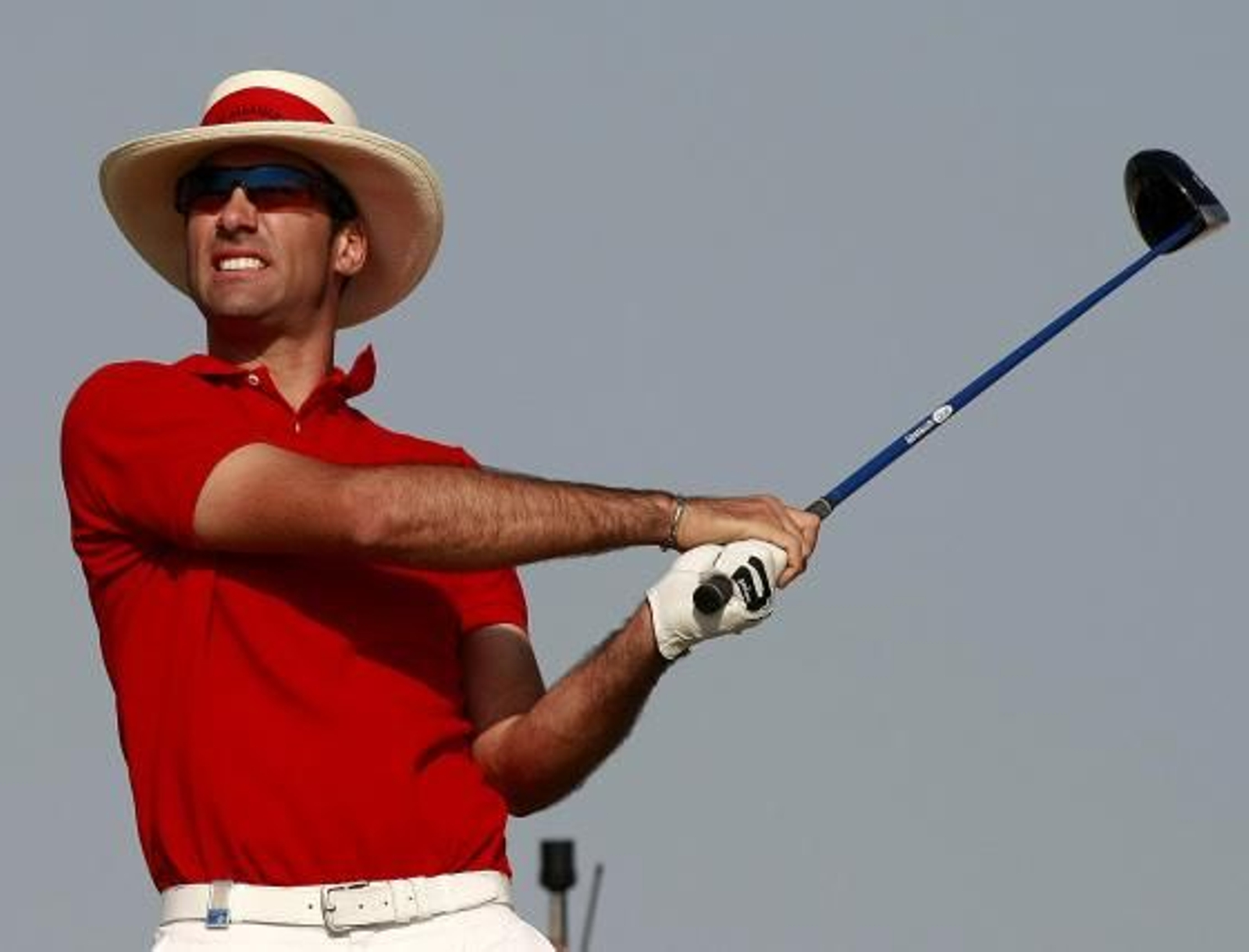 El golfista, justo en el momento después de ejecutar un golpe

Foto: Agencias