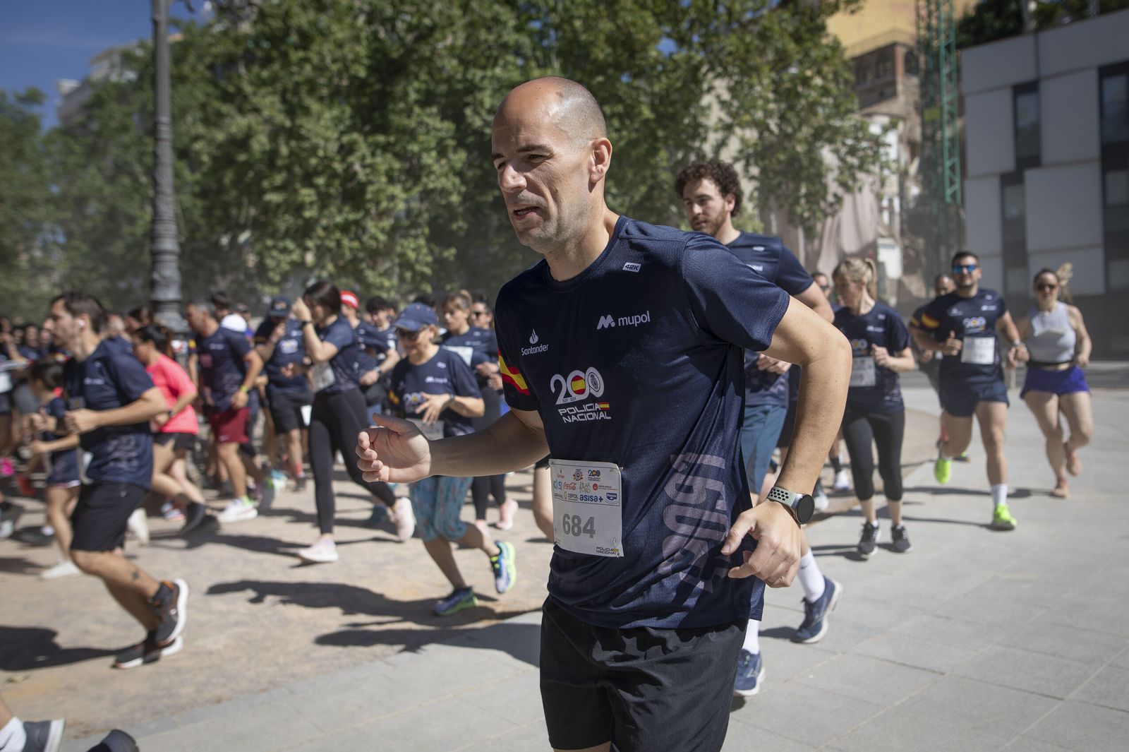 Encuéntrate en las imágenes de la carrera de la Policía Nacional 'Ruta 091'