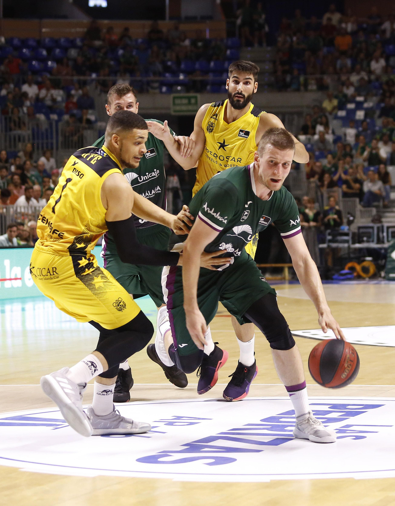 Los cinco años de Adam Waczynski en el Unicaja, en fotos