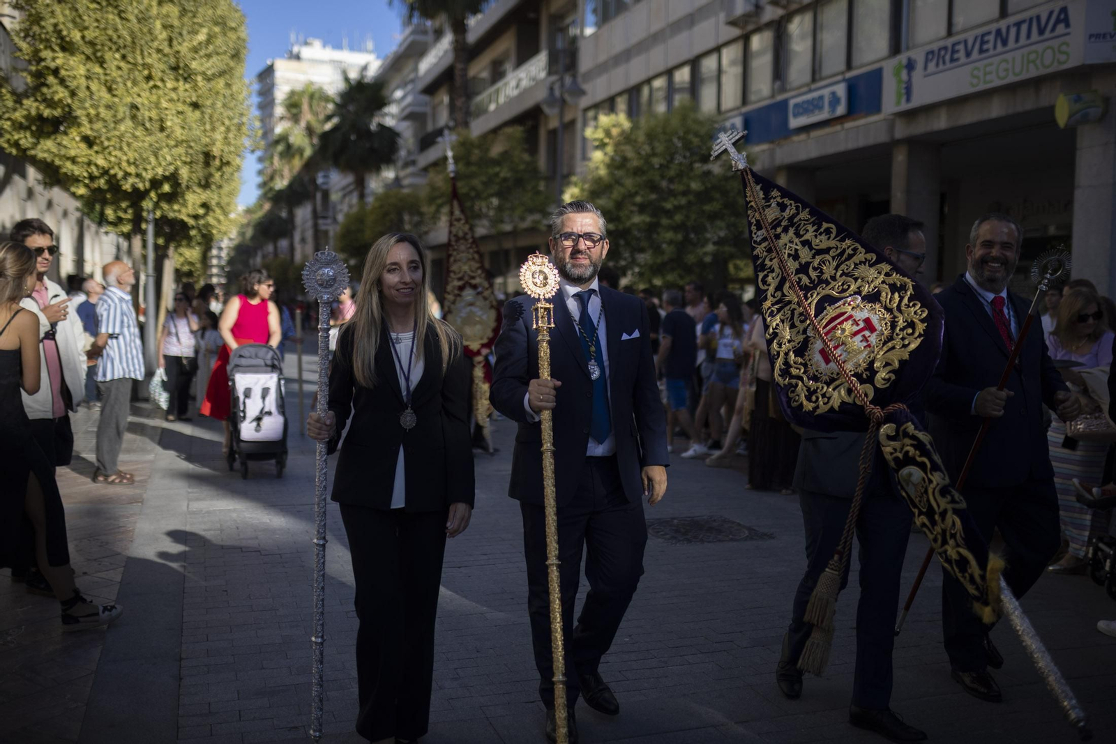 Imágenes de la salida extraordinaria de La Borriquita por las calles de Huelva