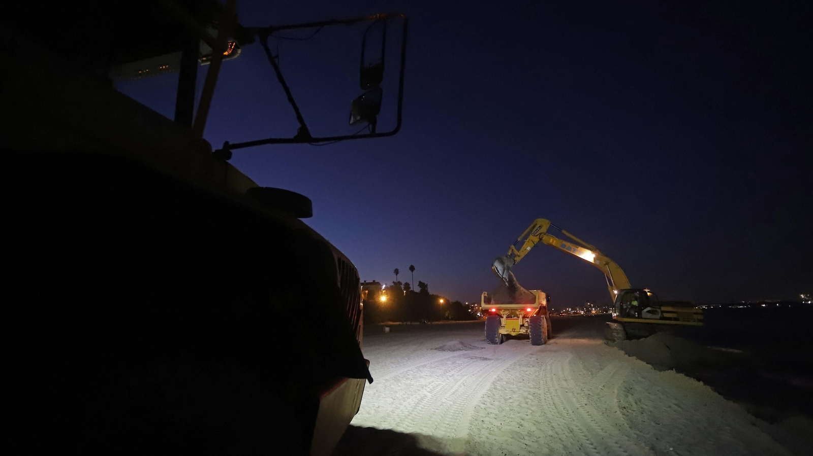 Fotos del trasvase de arena en El Rinconcillo