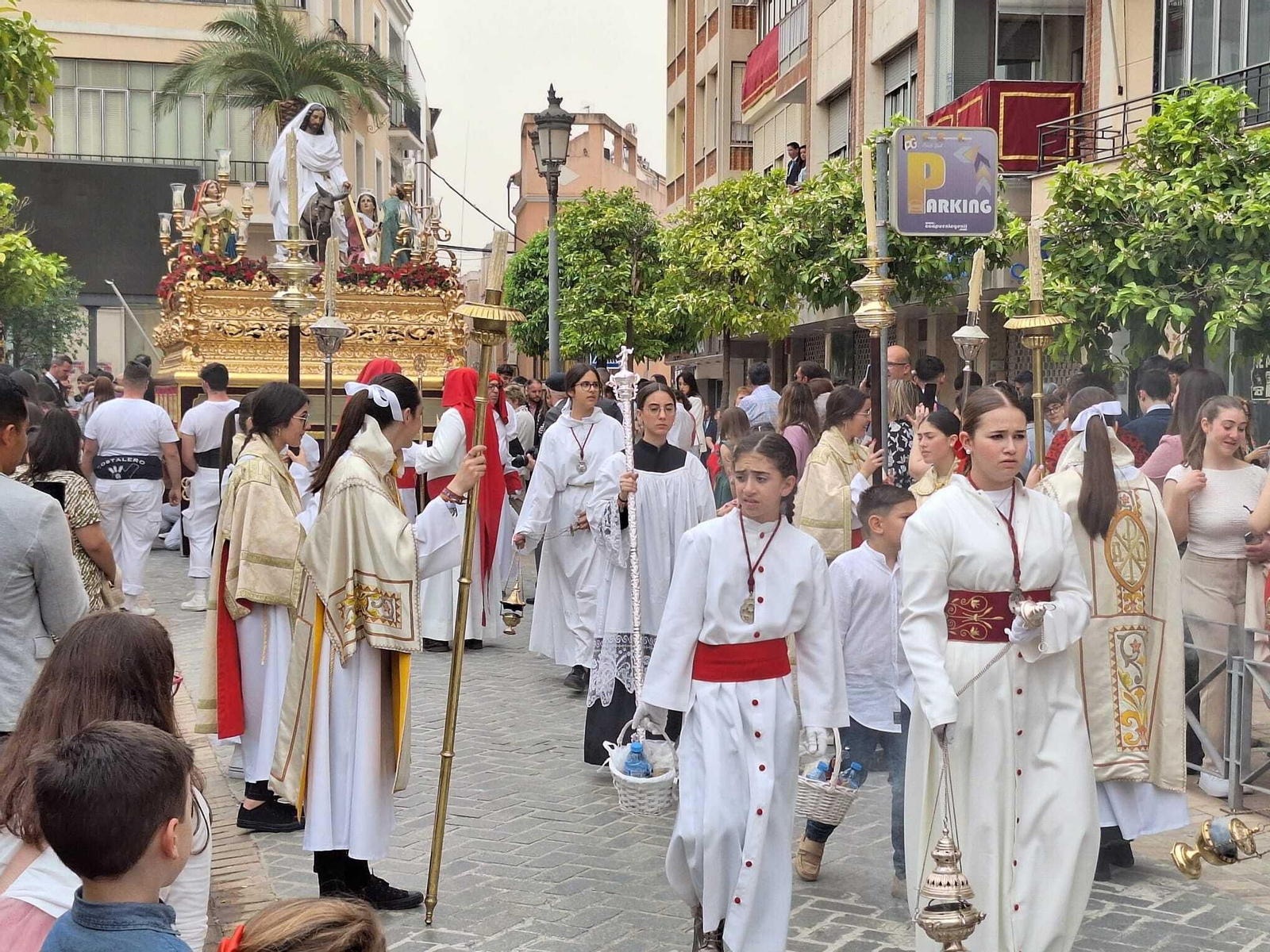 PUENTE GENIL La procesión de la Borriquita de Puente Genil el Domingo de Ramos 2024, en imágenes