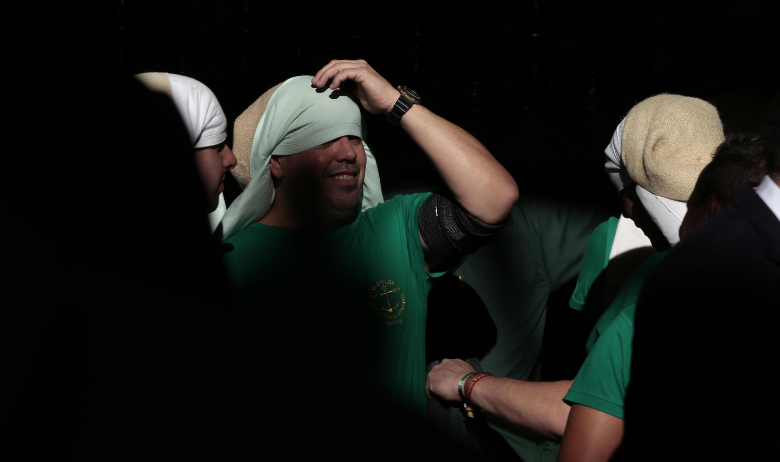 El traslado de la Esperanza de Triana, en imágenes