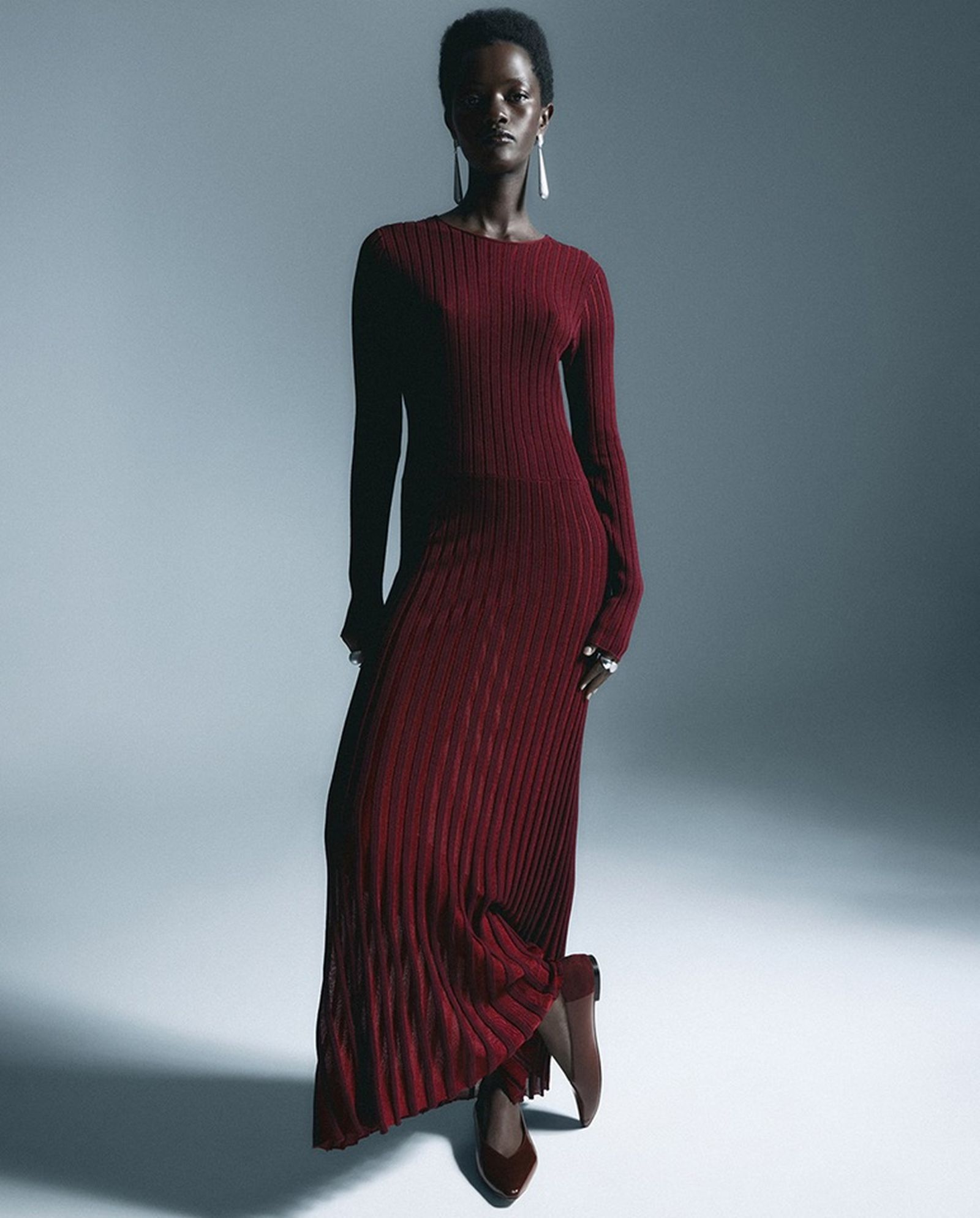 Vestido con pliegues de Sfera.