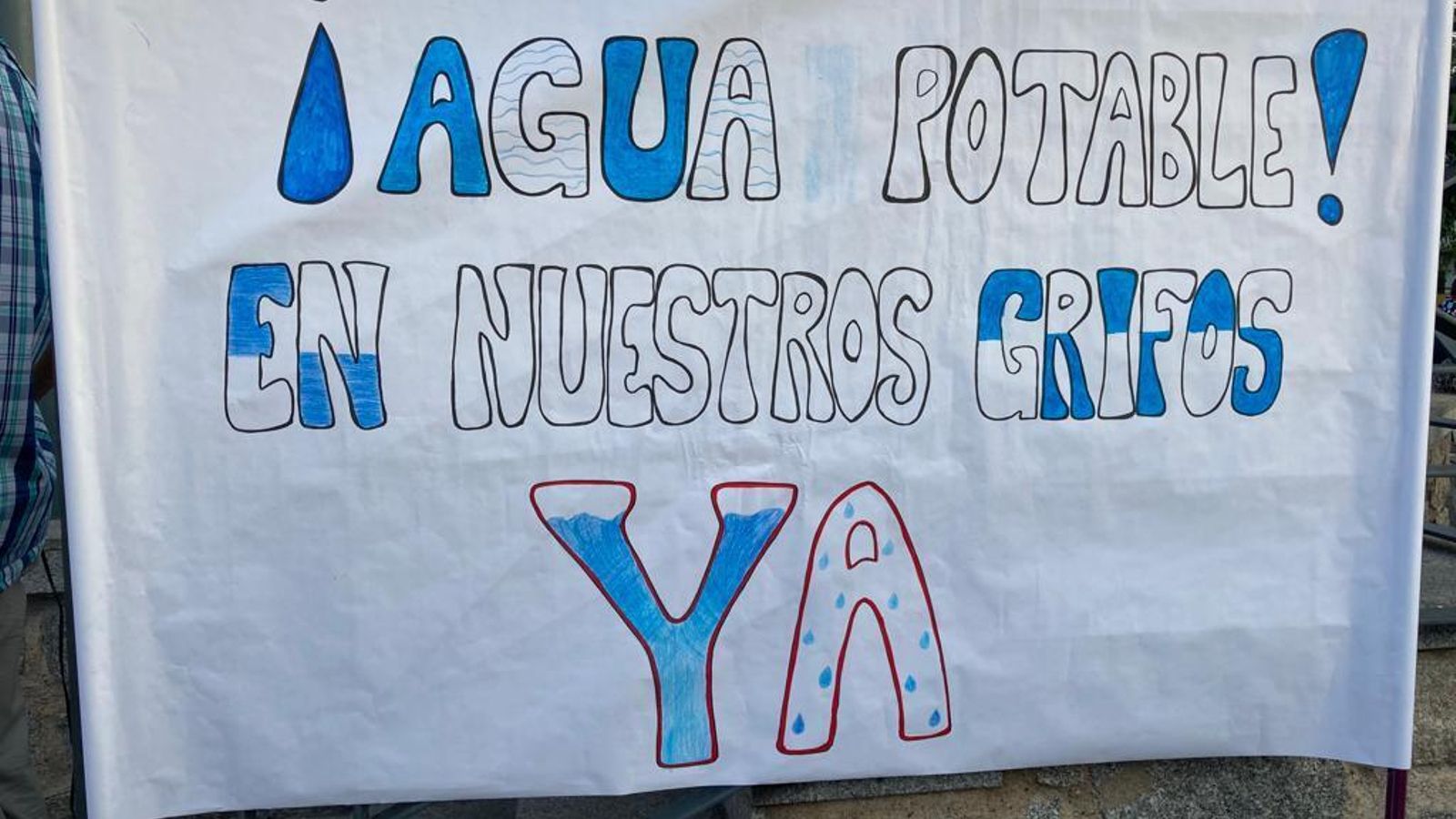 Una de las pancartas de la concentración.