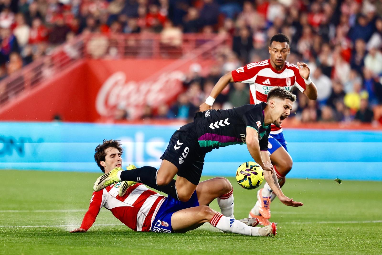 El Granada-Málaga CF, en fotos