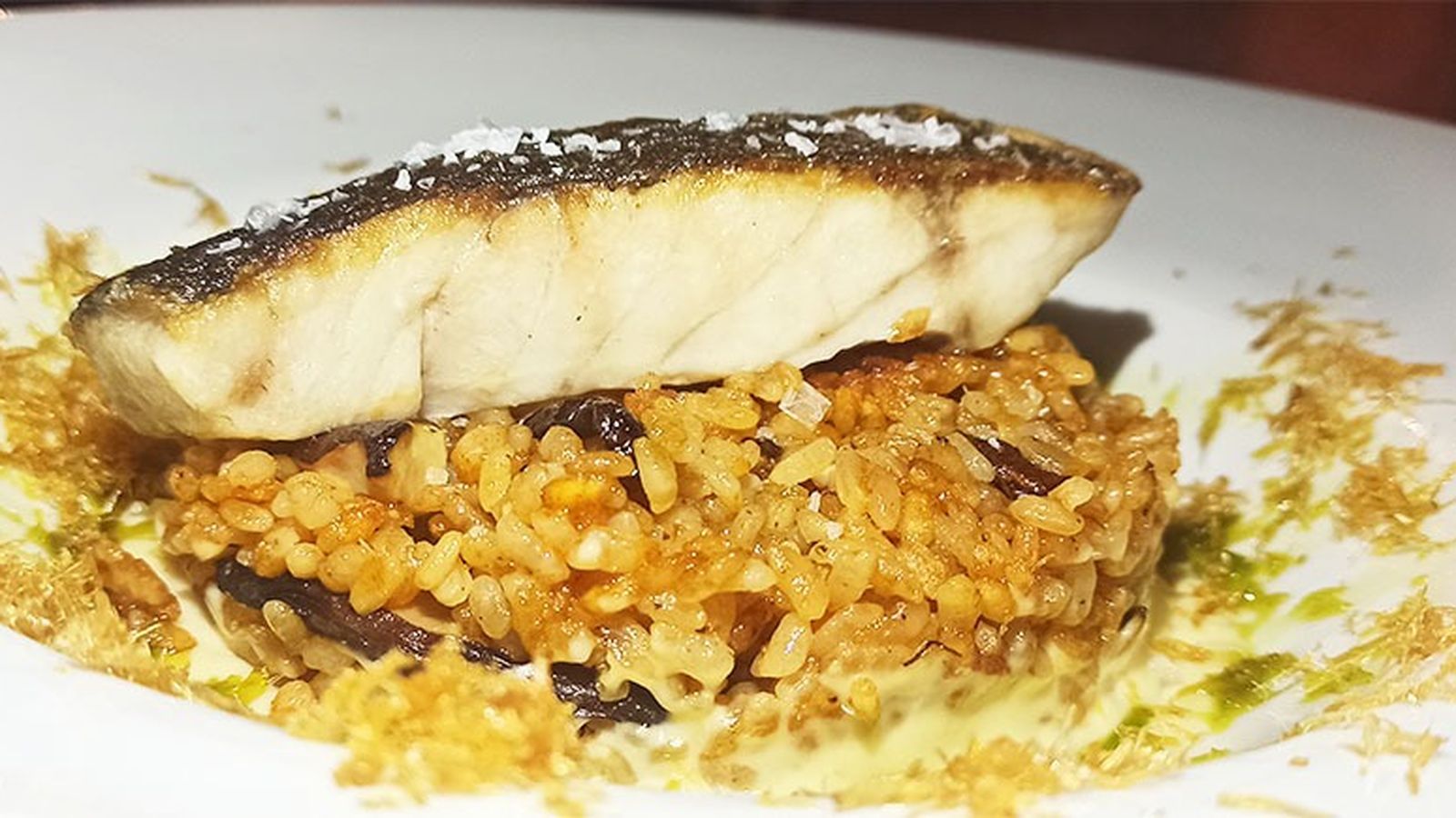 La corvina con arroz frito, otro de los originales platos del restaurante.