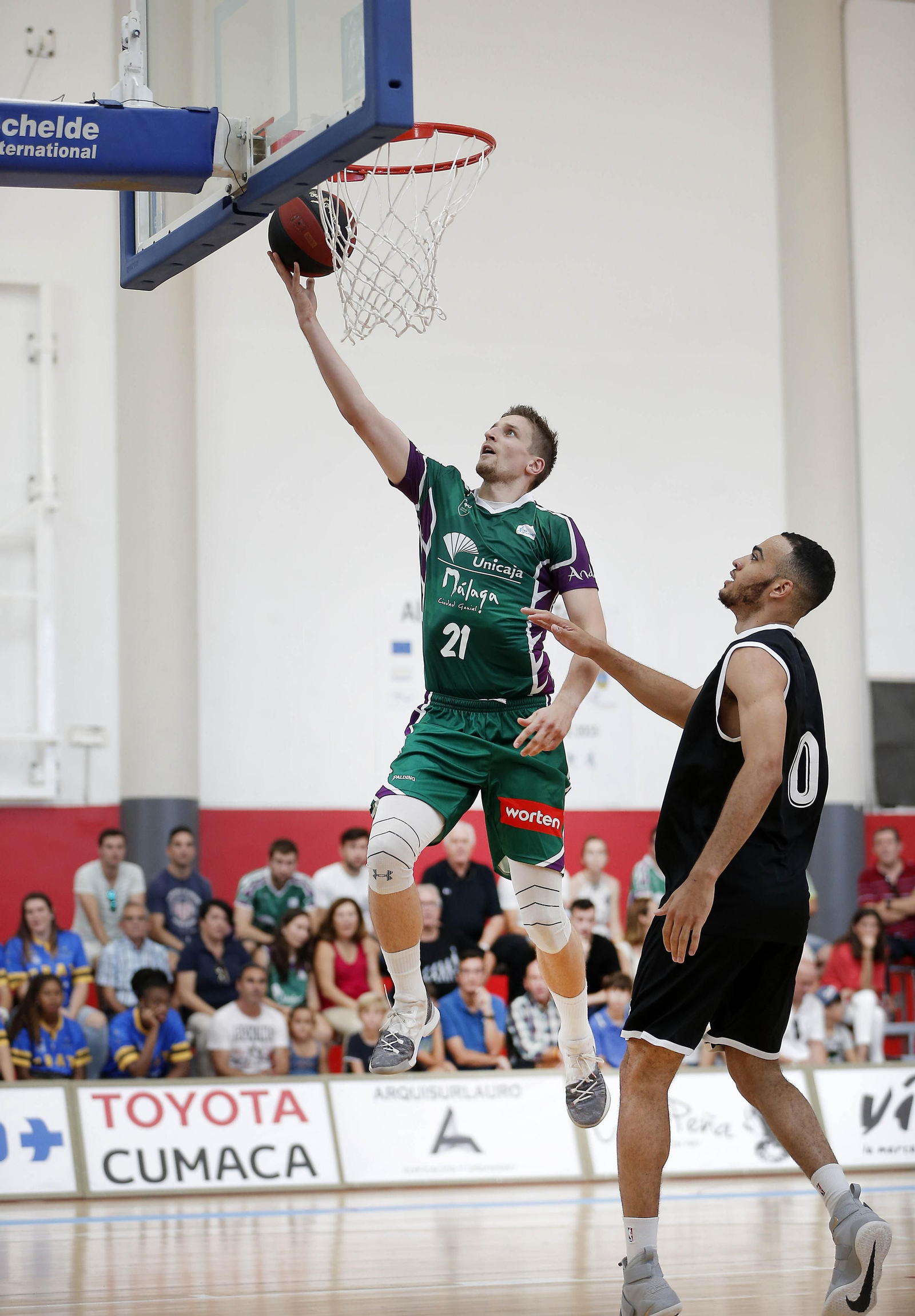 Los cinco años de Adam Waczynski en el Unicaja, en fotos