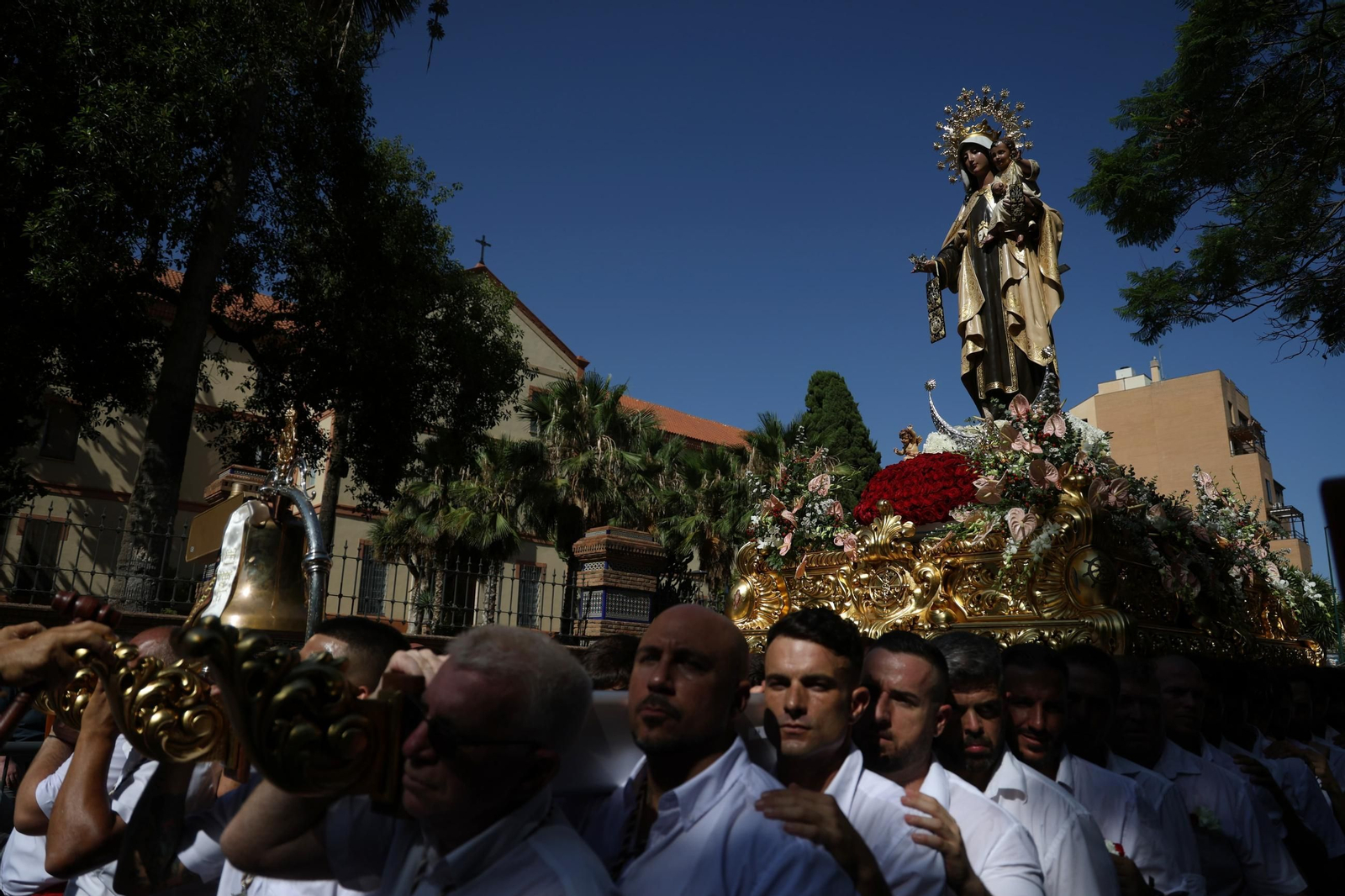 La procesión de la Virgen del Carmen en El Palo, en Málaga, en imágenes