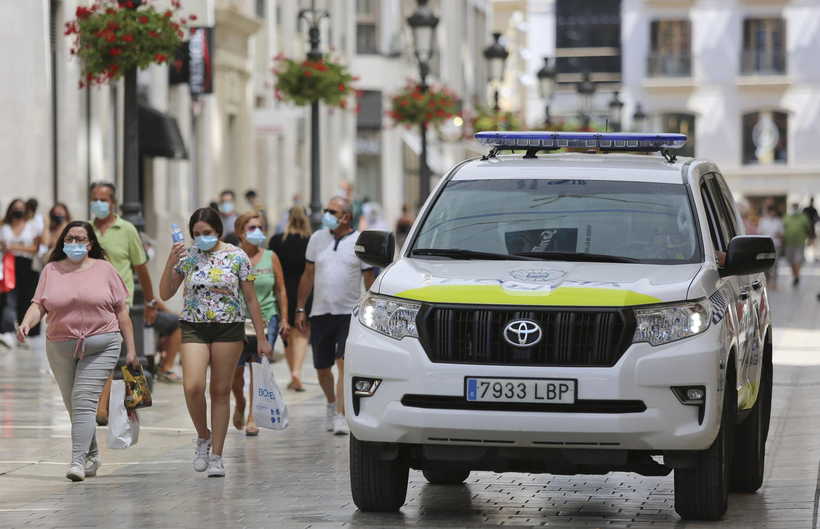 Fotos del primer día de mascarillas obligatorias en las playas y el Centro de Málaga