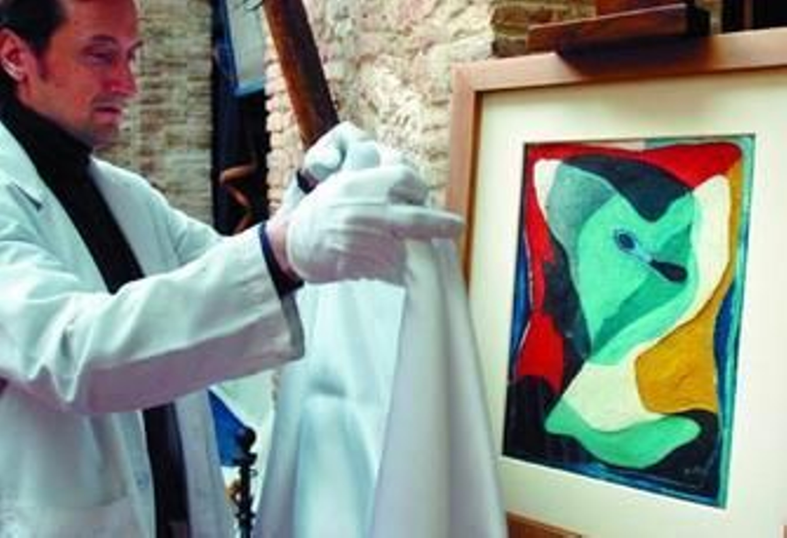 Salvador Dalí, retrato desdoblado en arlequín