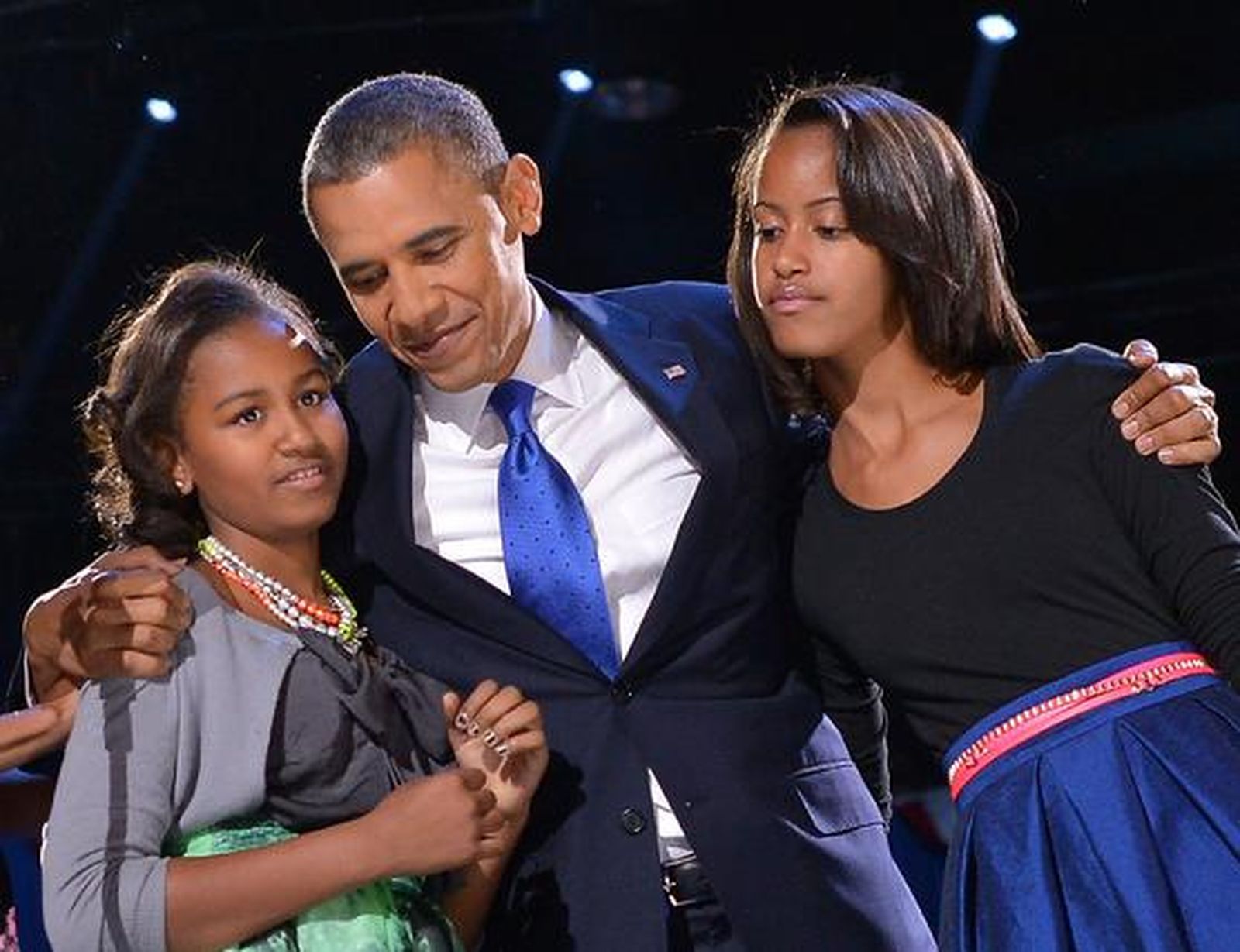 Obama con sus dos hijas.

Foto: Reuters