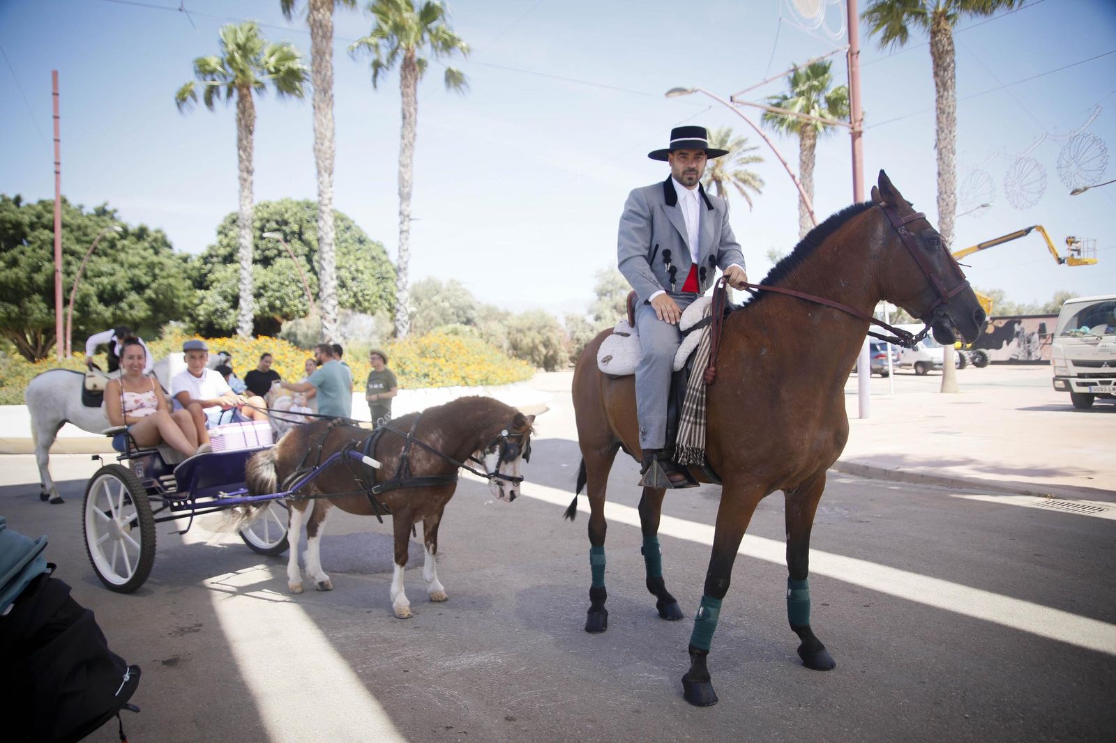 Las imágenes del paseo de Caballos y Carruajes, en el recinto ferial