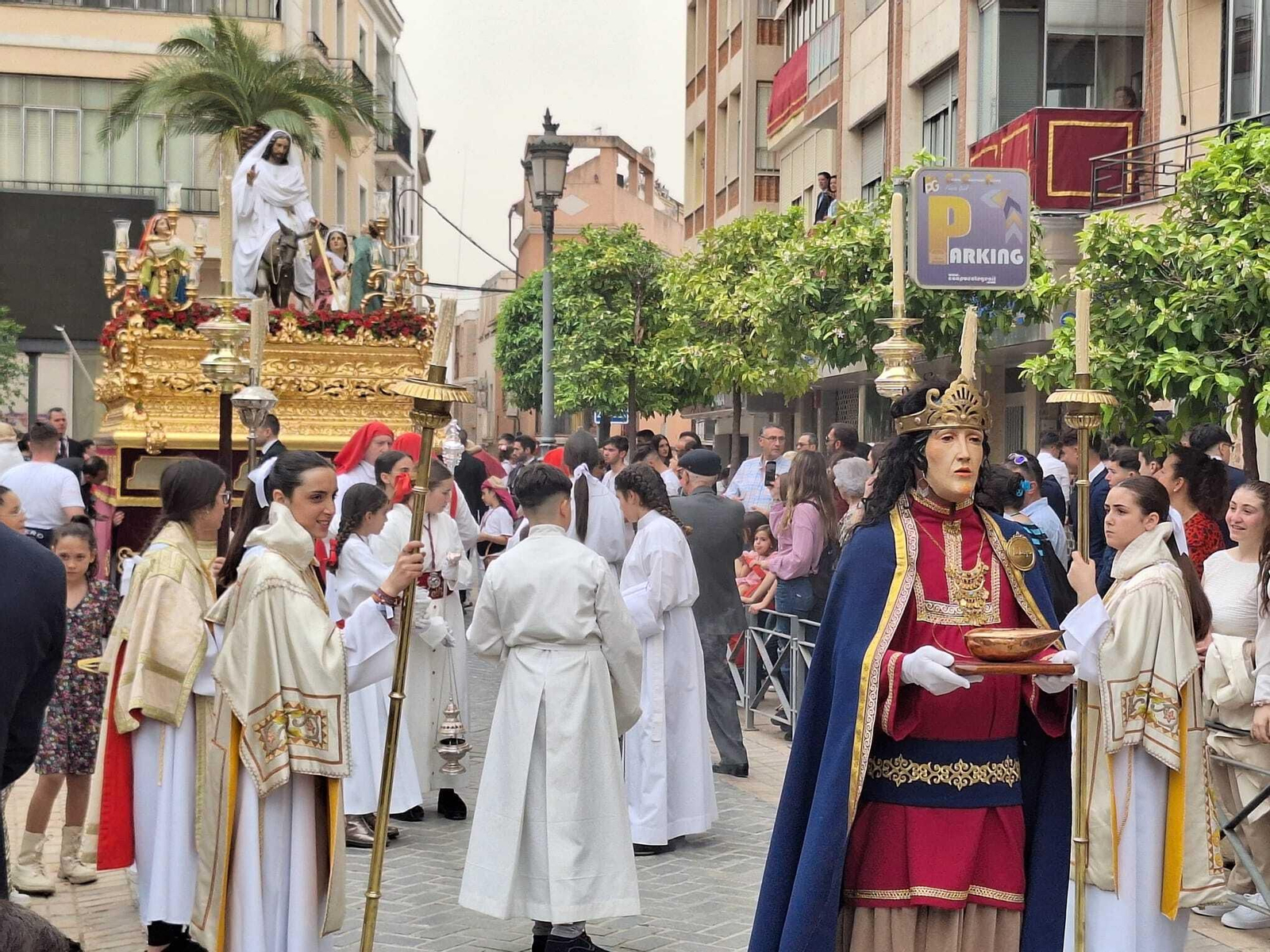 La procesión de la Borriquita de Puente Genil el Domingo de Ramos 2024, en imágenes