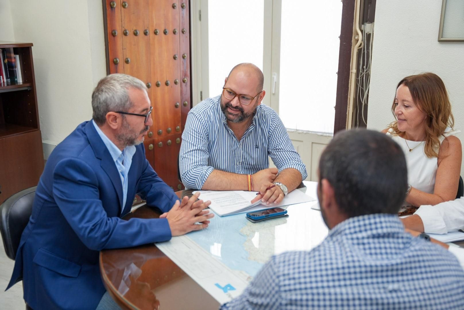 Los responsables en la reunión de trabajo.