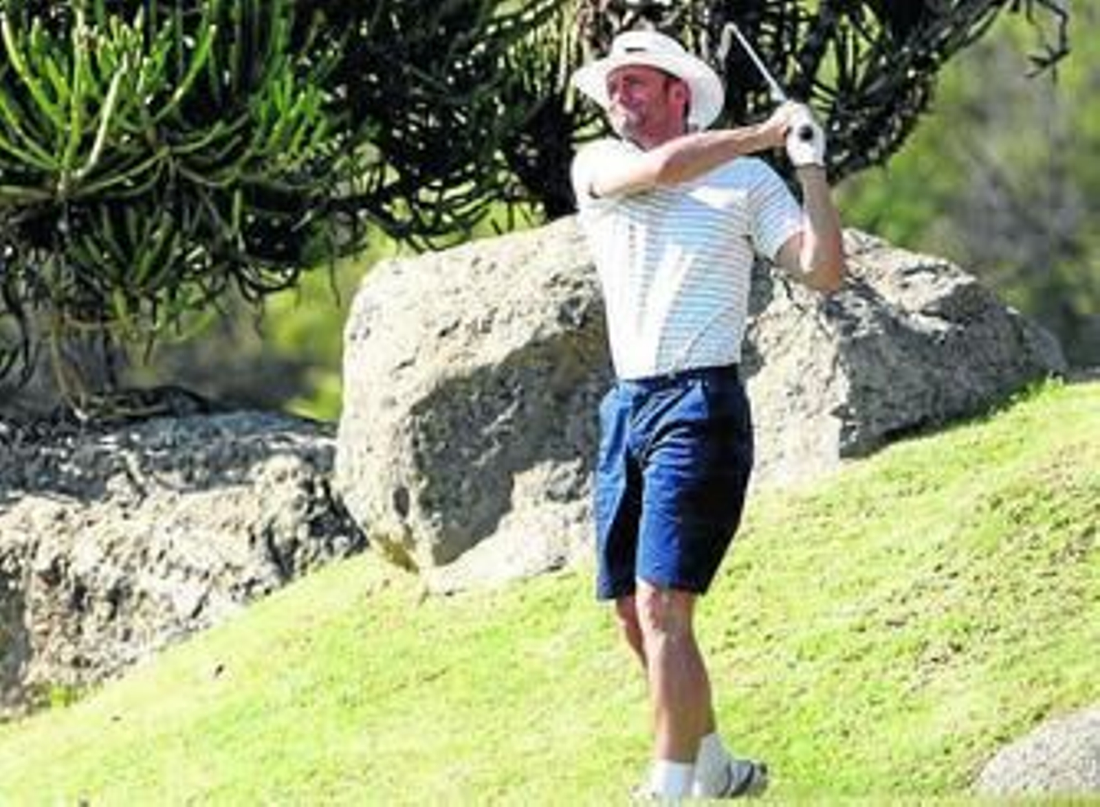 Robert Green juega al golf en el día de descanso de Inglaterra.