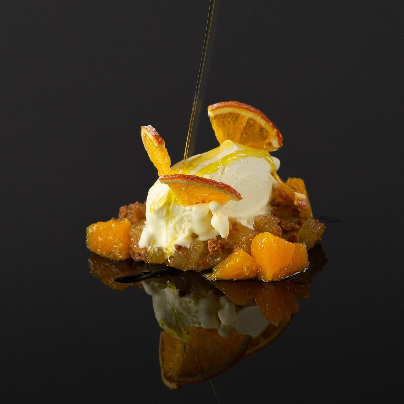 Helado de aceite con texturas de naranja