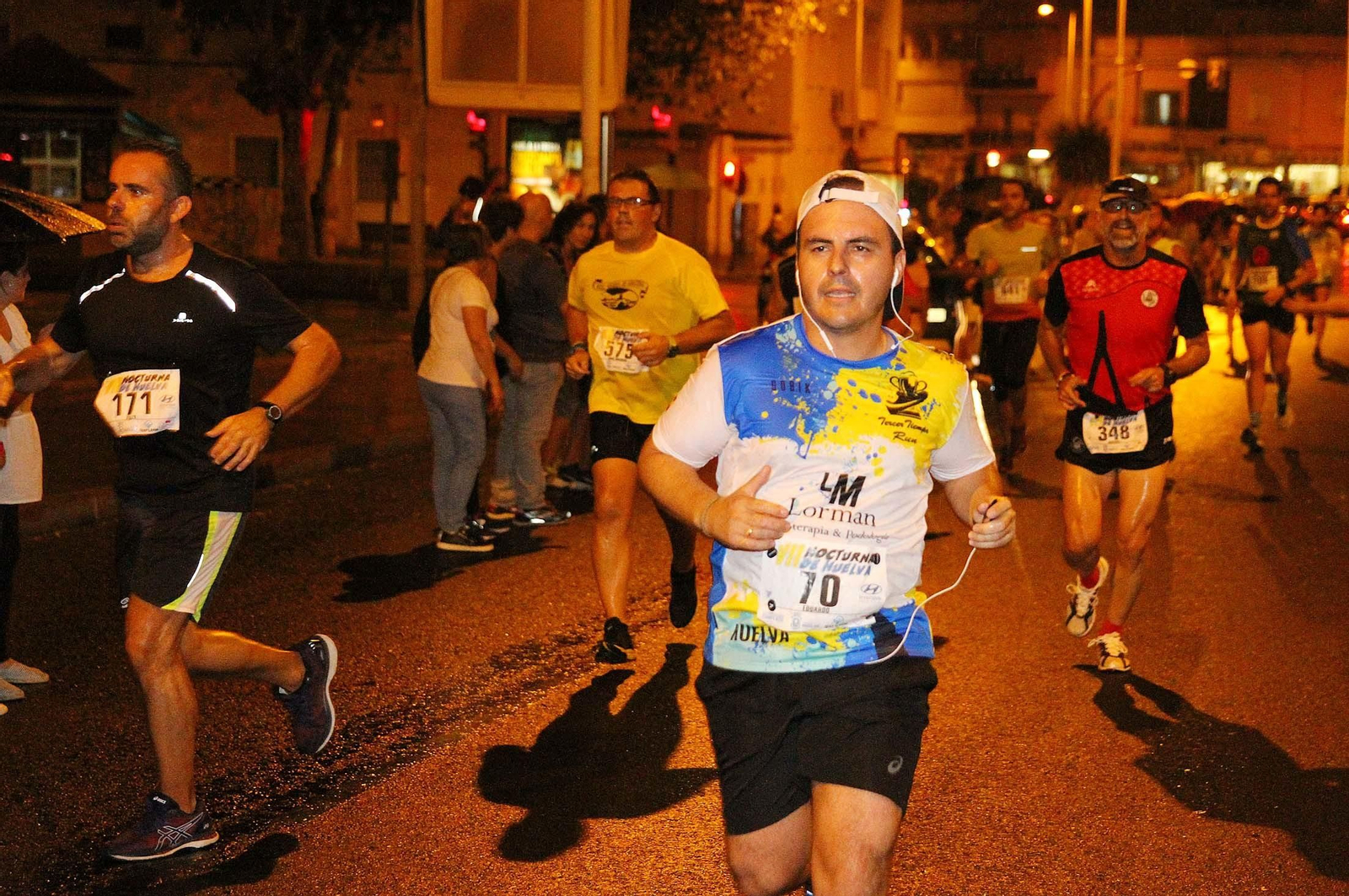 La VII Carrera Nocturna de Huelva en imágenes