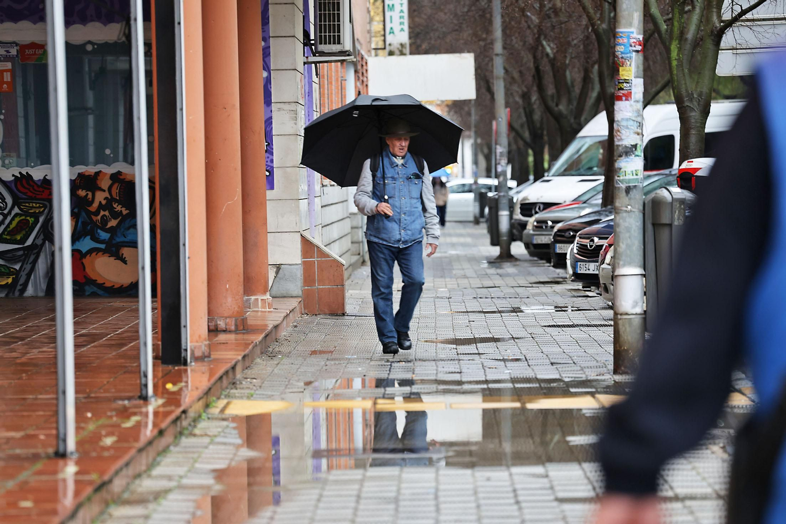 Las imágenes de la lluviosa mañana del jueves 13 de marzo en Huelva