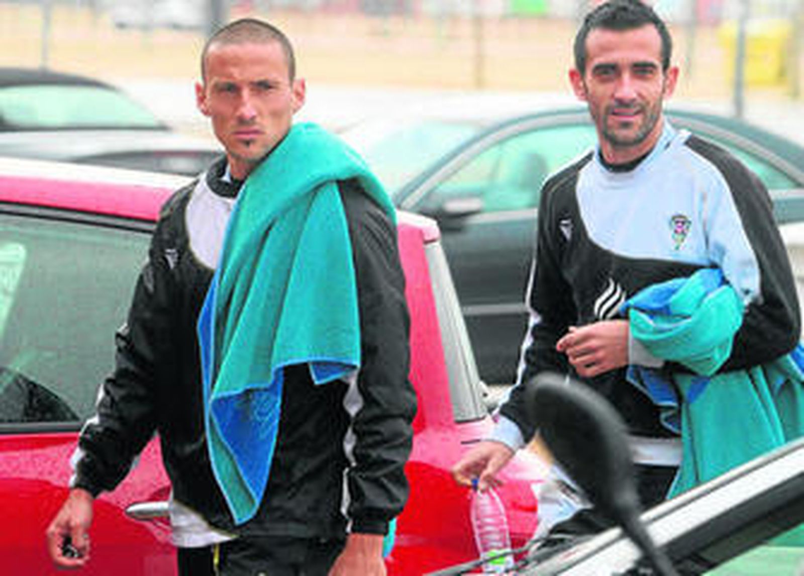 Jorge Luque y David de Coz llegan al estadio tras una sesión en la Ciudad Deportiva.