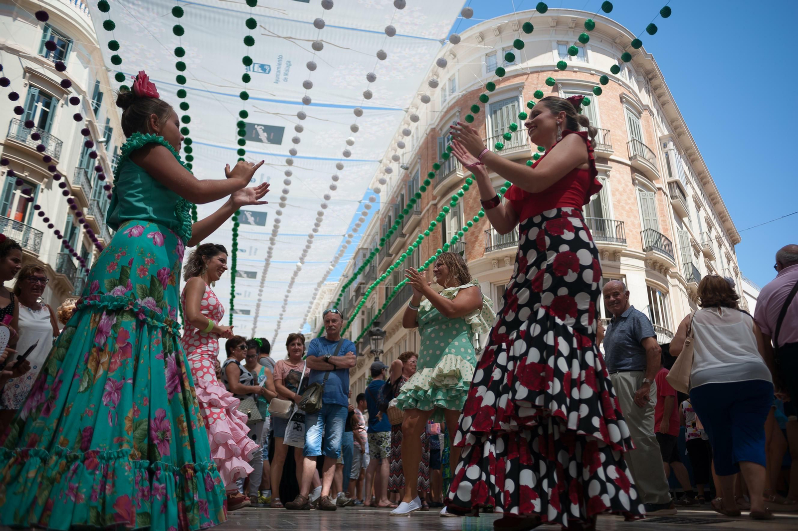 Celebración de la Feria de Málaga del año pasado en la calle Larios.