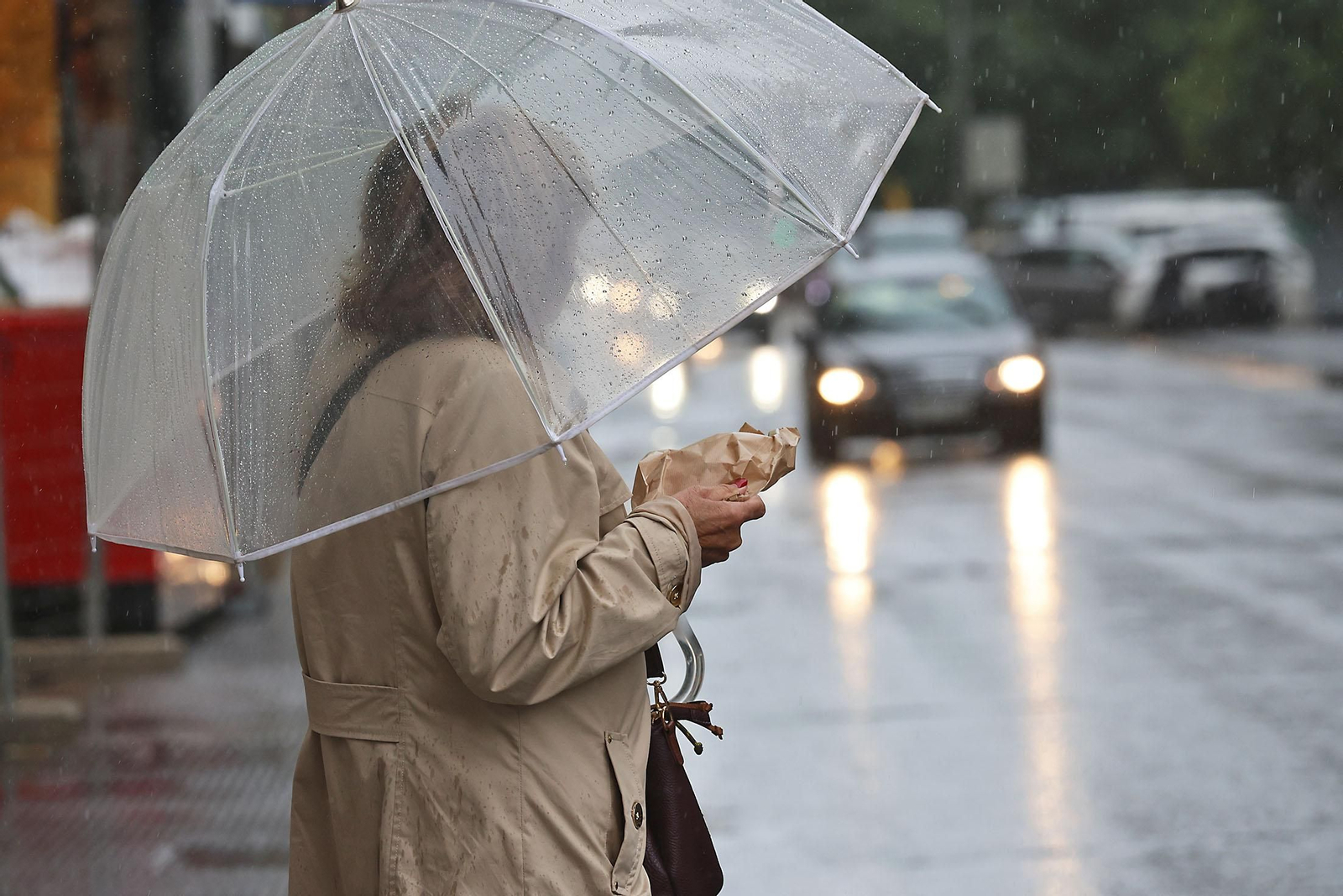 Imágenes de la lluviosa mañana de sábado en Huelva