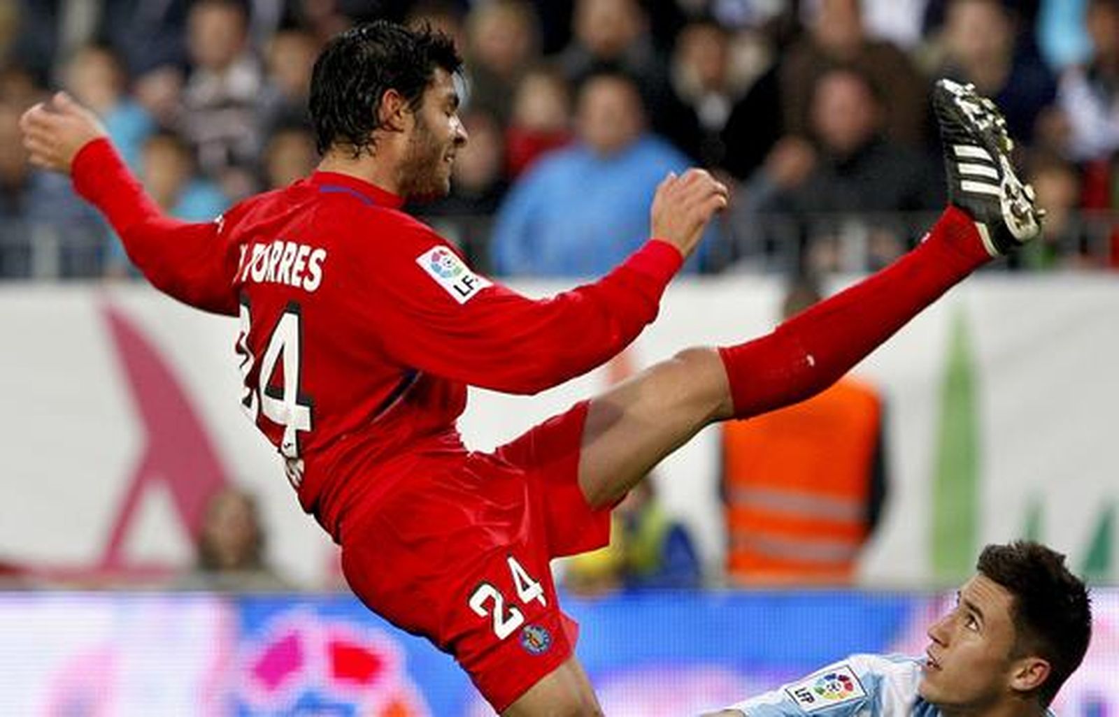 El Málaga respira tras su victoria en Liga ante el Getafe. / Sergio Camacho