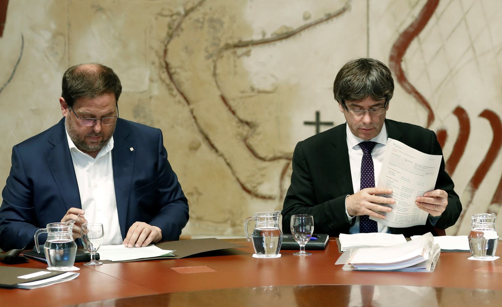 Carles Puigdemont y Oriol Junqueras.