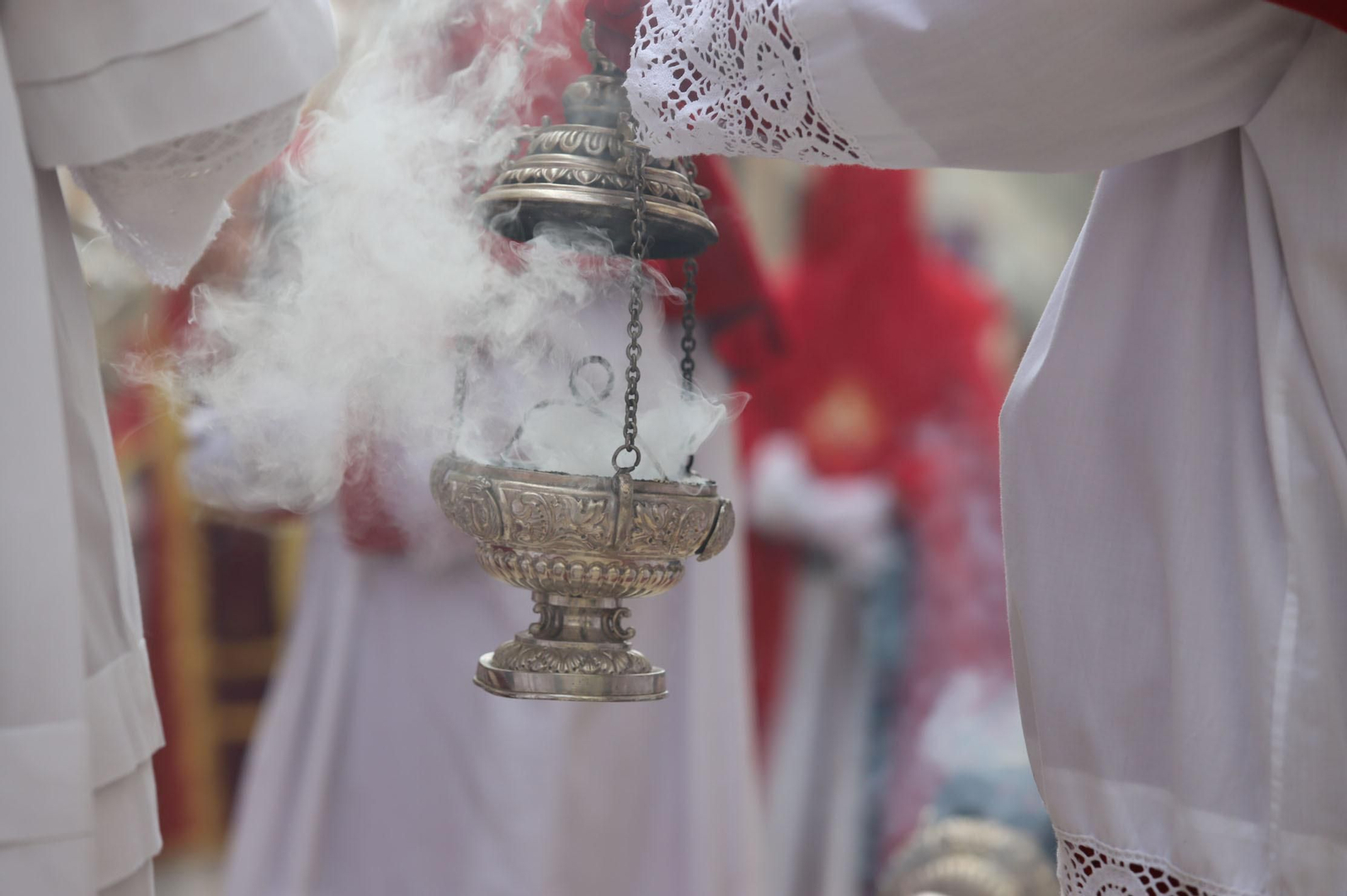 Imágenes del recorrido de la Borriquita  por las calles de Huelva