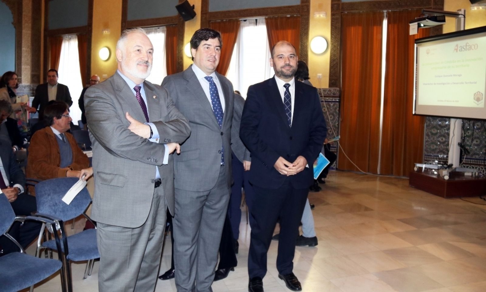 Muñoz Usano, Coca López y Quesada, en el Rectorado.