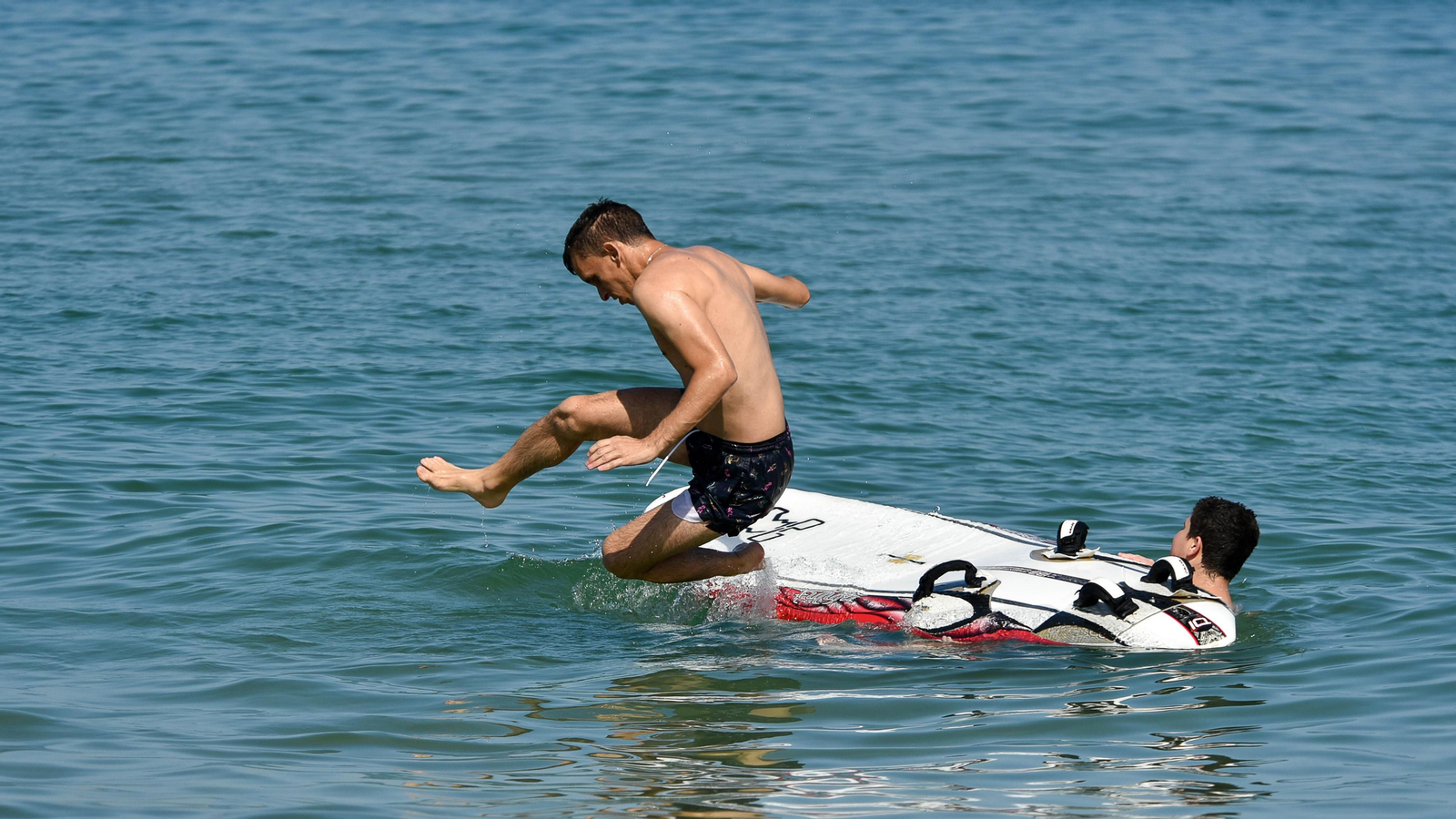 Fotos de la tarde en la playa del El Rinconcillo en plena ola de calor