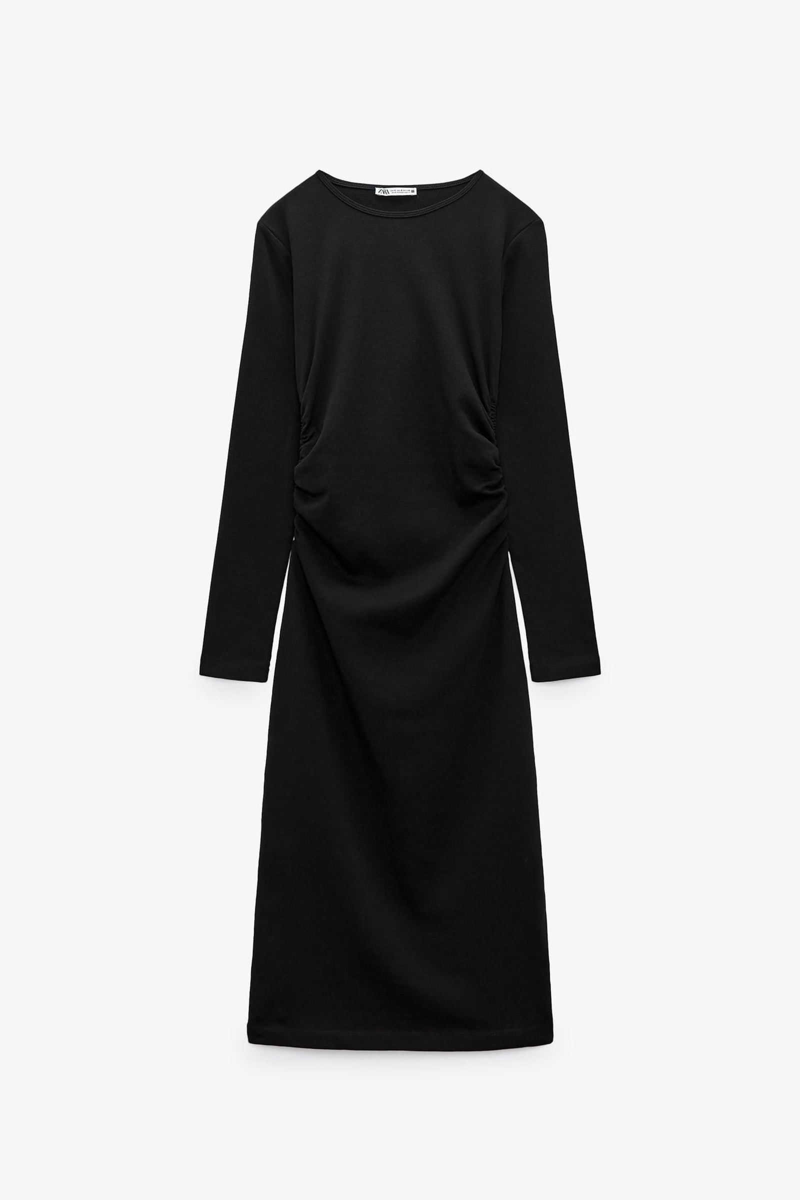 Vestido negro de Zara.