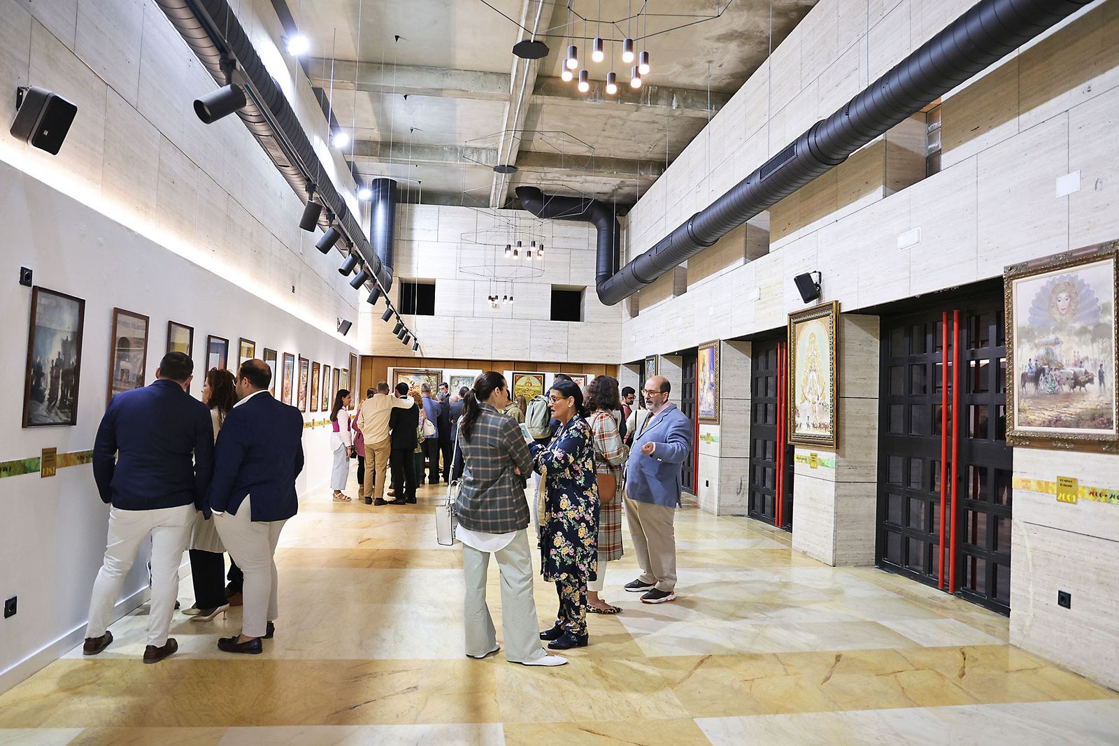 Imágenes de la inauguración de la exposición 'Sueños de Rocío. Carteles de Romería'.