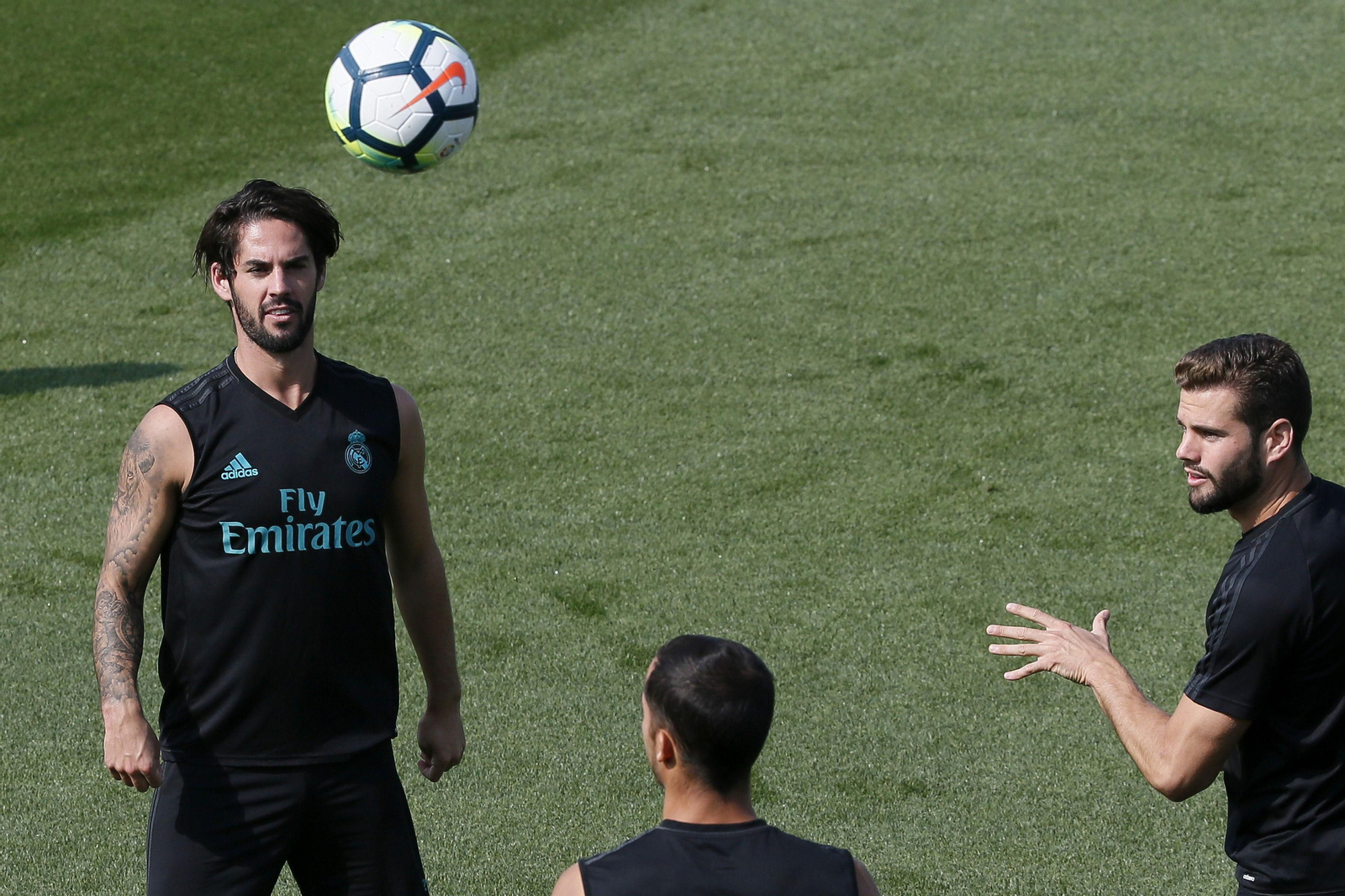 Isco, Lucas Vázquez y Nacho, durante el entrenamiento del Real Madrid en Valdebebas. Isco, Lucas Vázquez y Nacho, durante el entrenamiento del Real Madrid en Valdebebas.