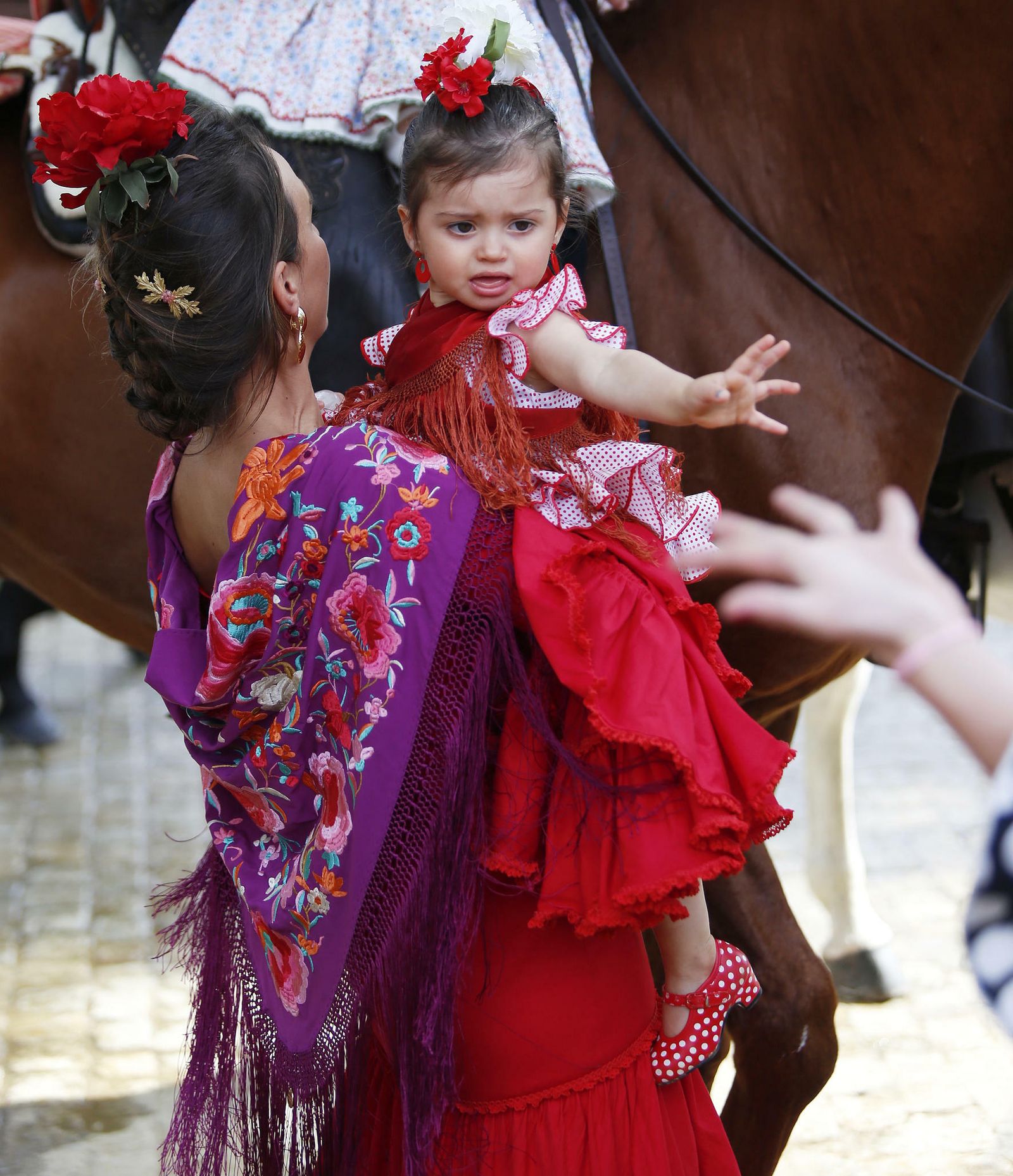 El Lunes de Feria, el primero con silencio en los 'cacharritos', en imágenes
