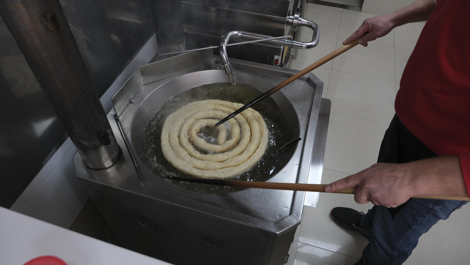 Fotogalería churro-pizza. Churrería Plaza Mayor. Huércal Overa.