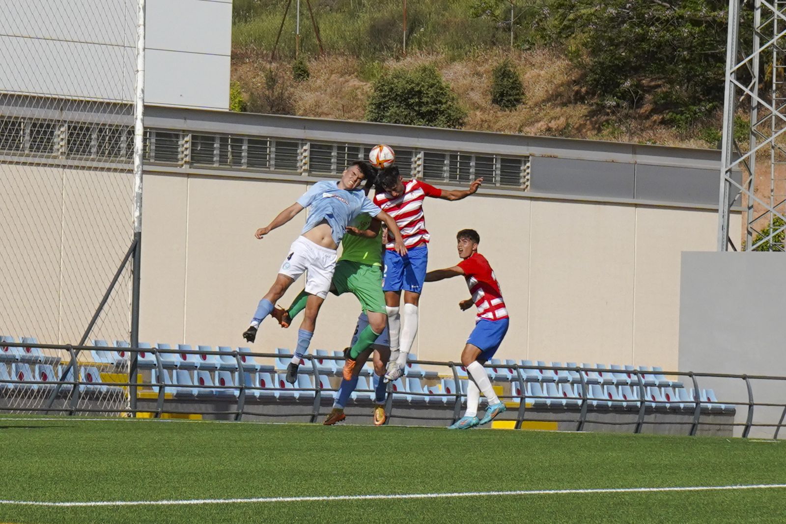 Una acción del partido entre Granada CF y Poli Ejido