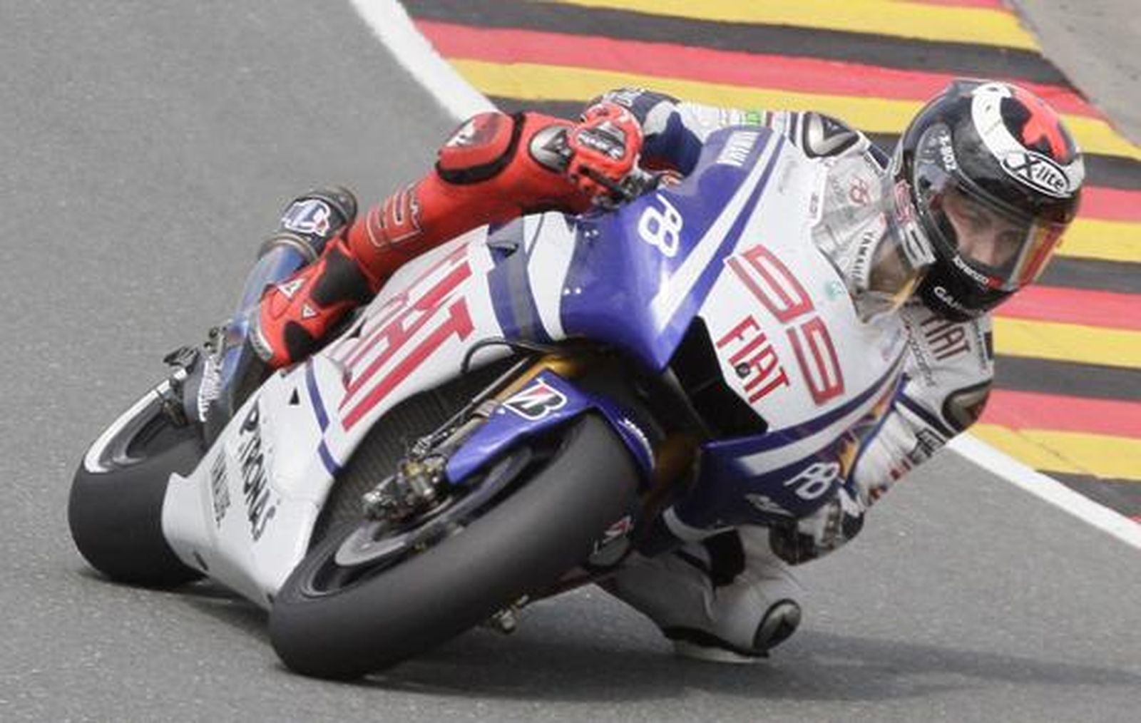 Pedrosa, Elías y Márquez firman una nueva jornada memorable para el motociclismo español. / Reportaje gráfico: EFE, Reuters, AFP.