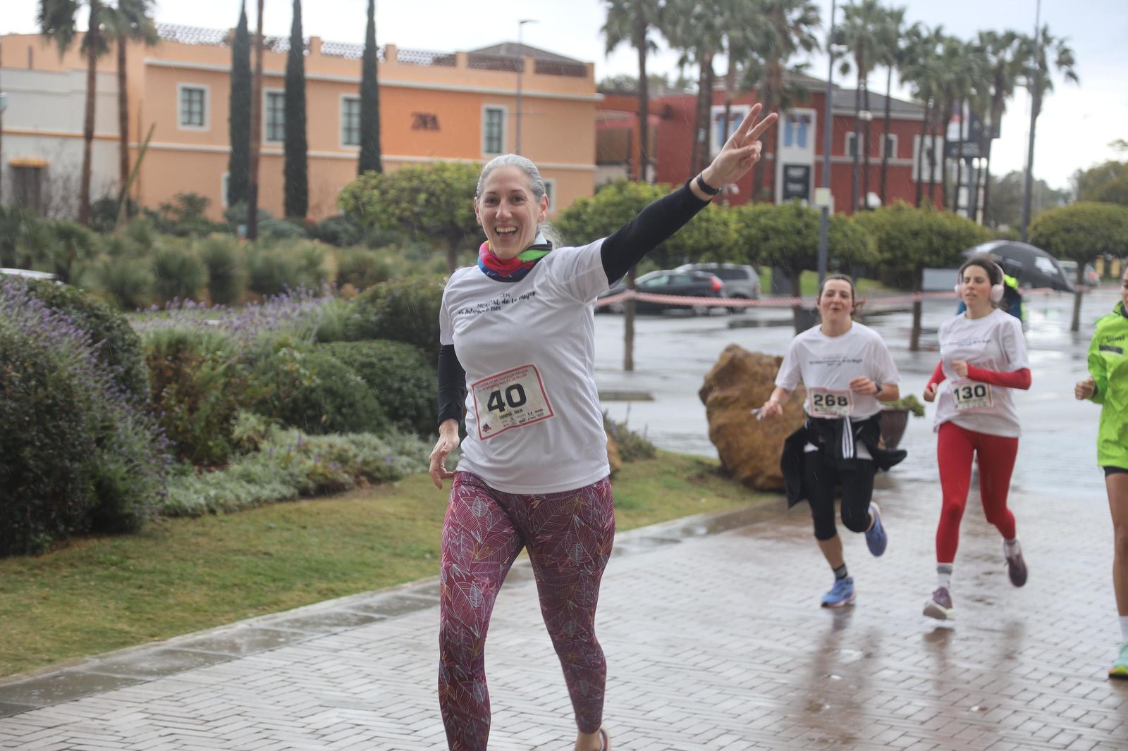 La Carrera por el Día Internacional de la Mujer en Málaga, en fotos