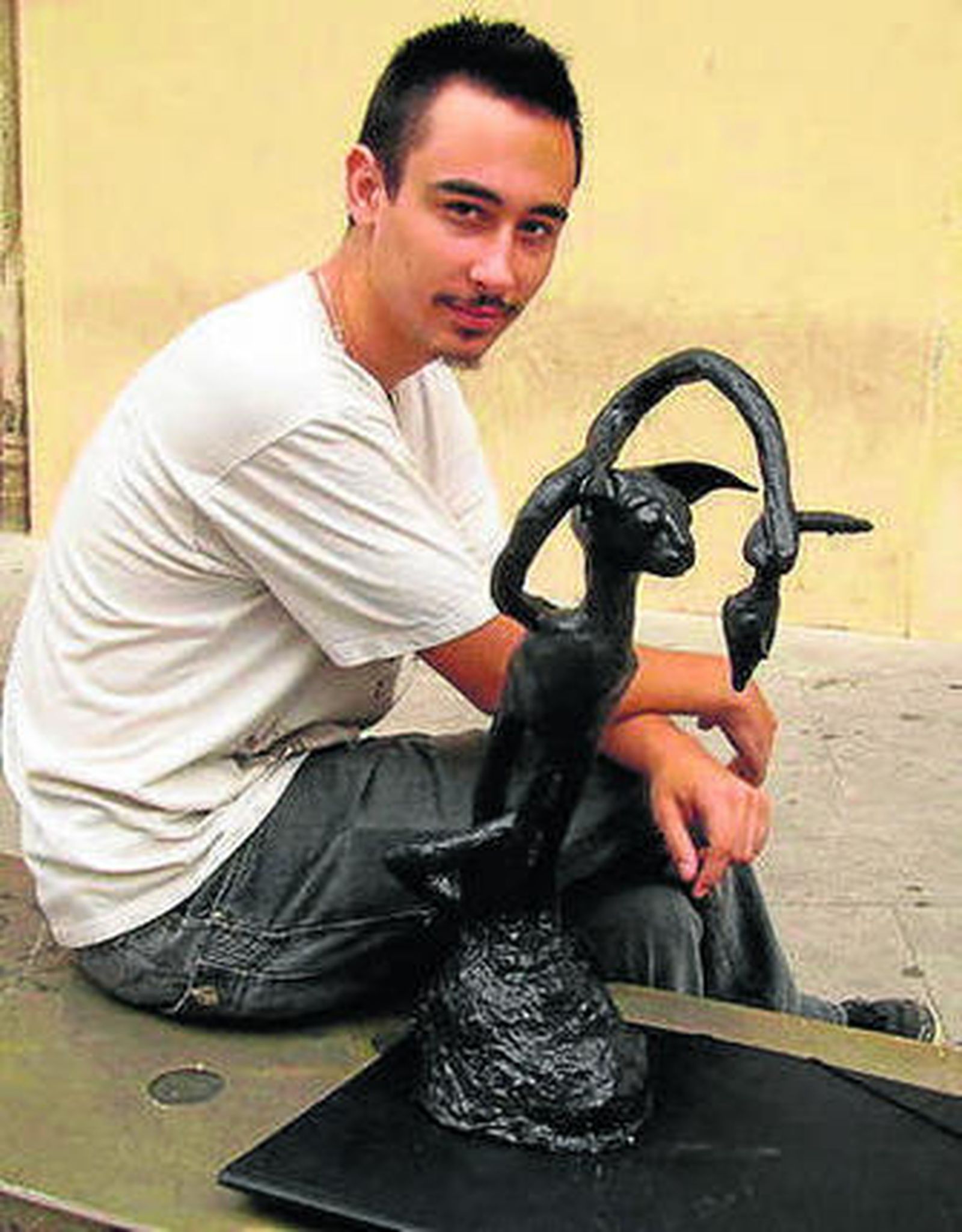 José Joaquín Solís y su gato.