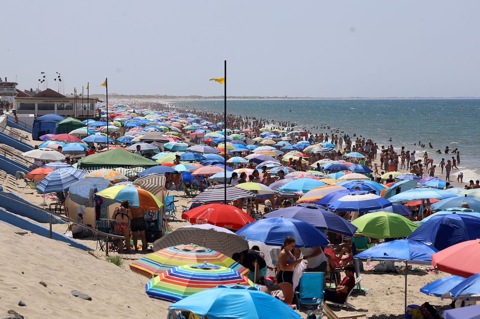 Imágenes de una mañana de calor y playa en Matalascañas