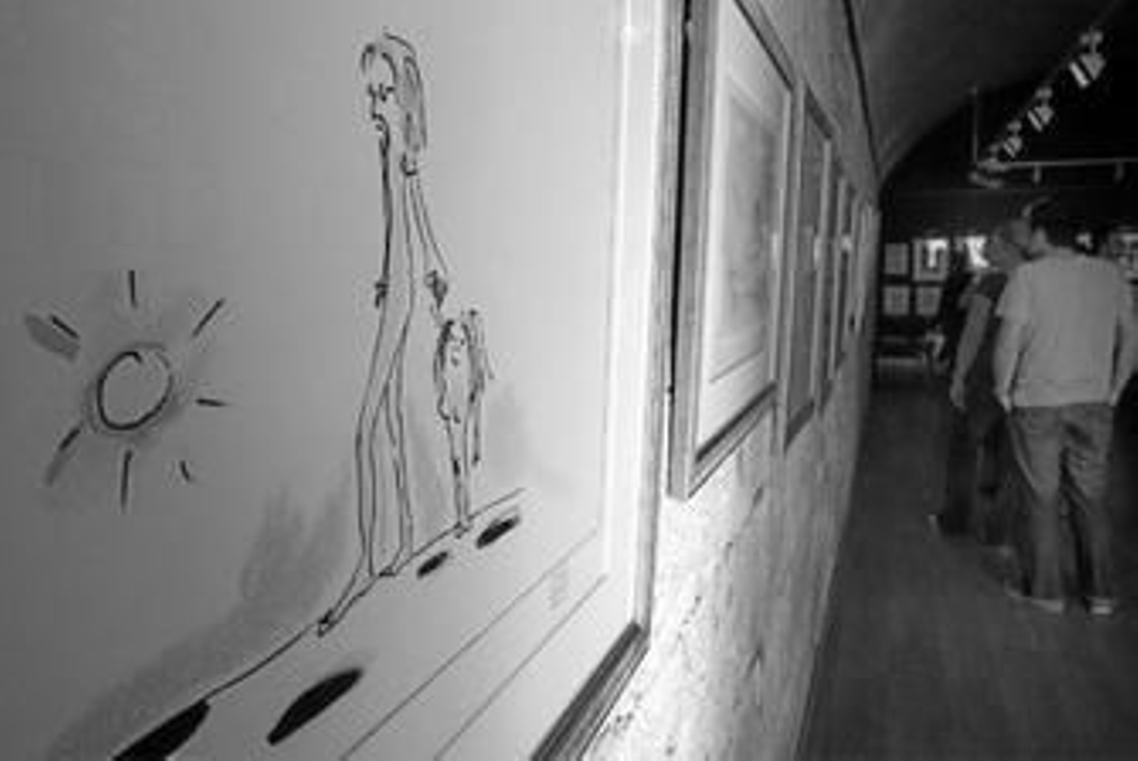 Algunas de las obras de 'El arte de John Lennon' que se exponen en la Galería de Bellas Artes de Gibraltar.