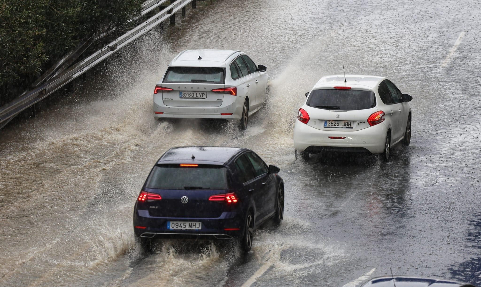 El tráfico en Málaga tras las lluvias, en fotos